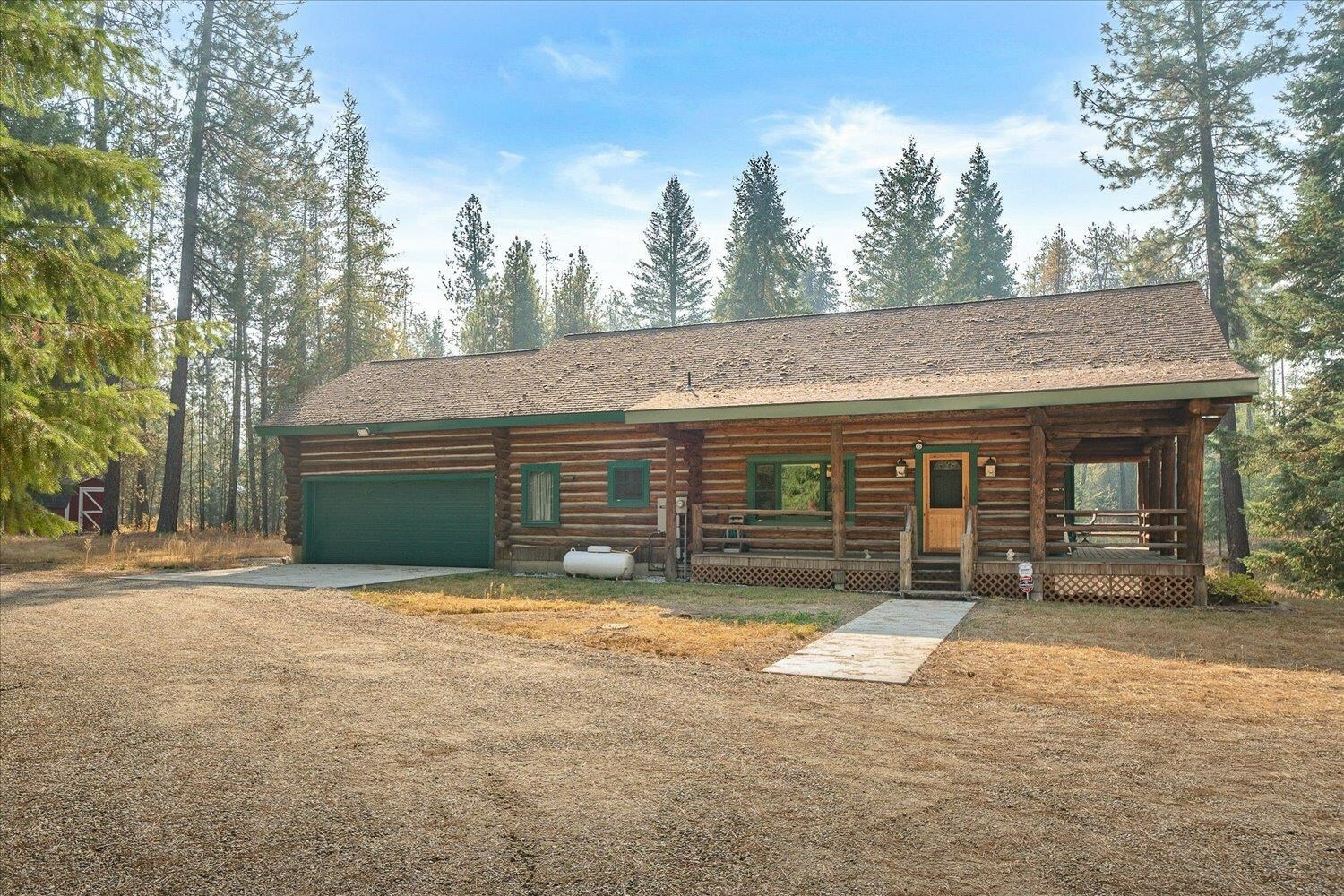 Property Photo:  11224 E Whispering Pines Rd  WA 99009 