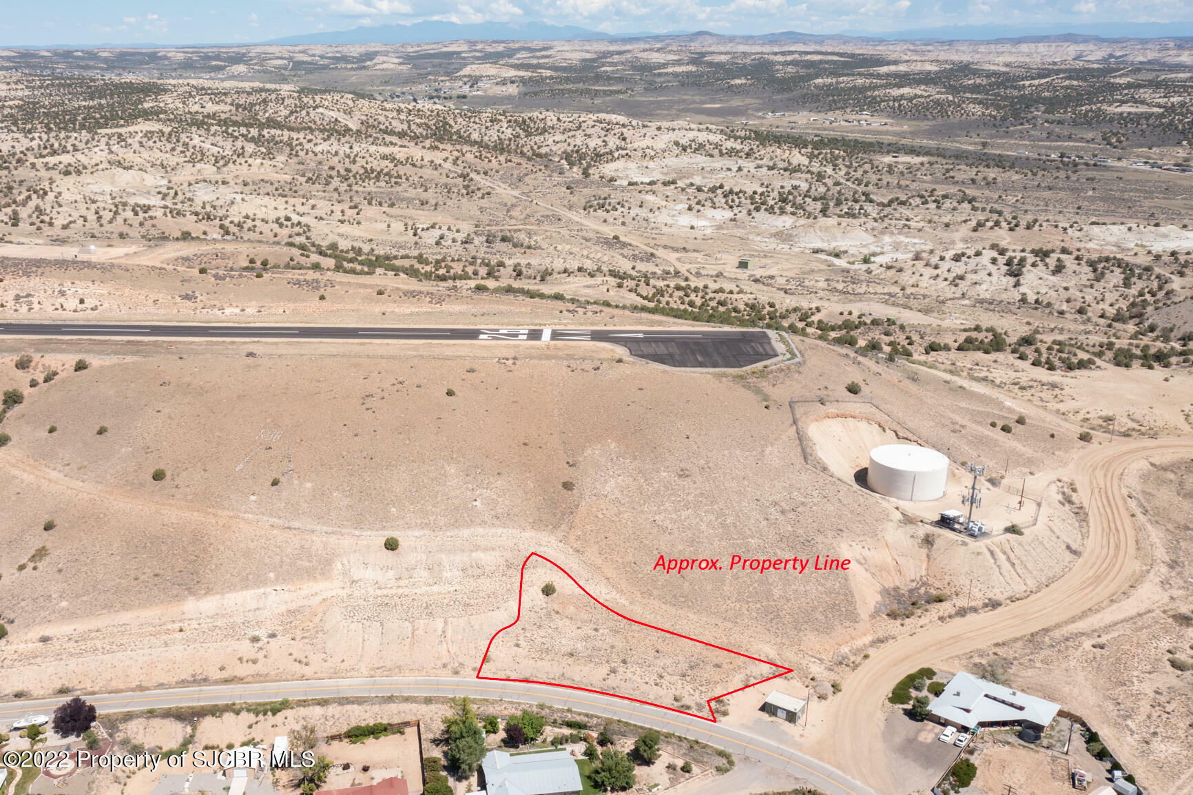 Property Photo:  703 Airport Drive  NM 87410 