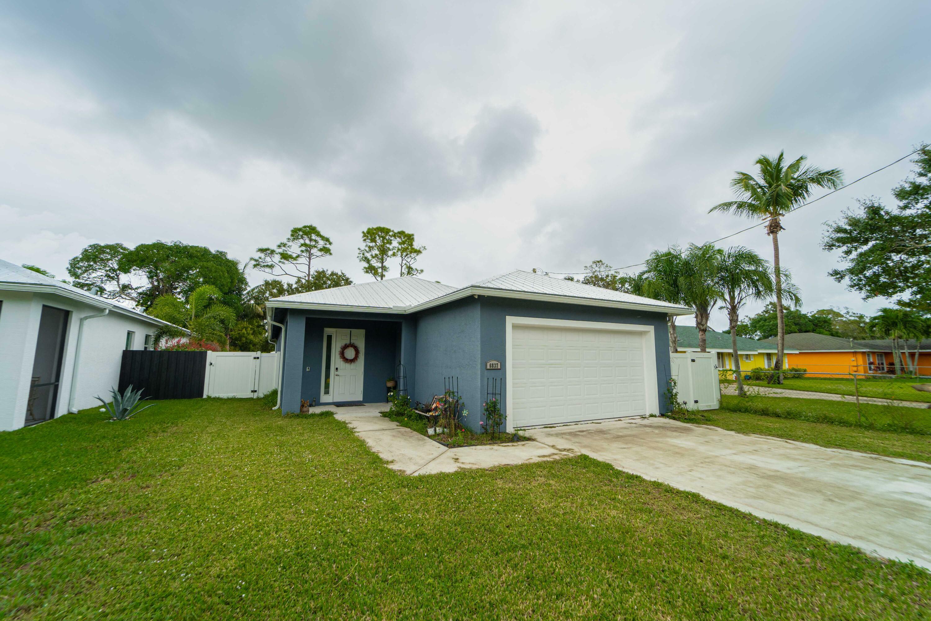 Property Photo:  6837 1st Street  FL 33458 