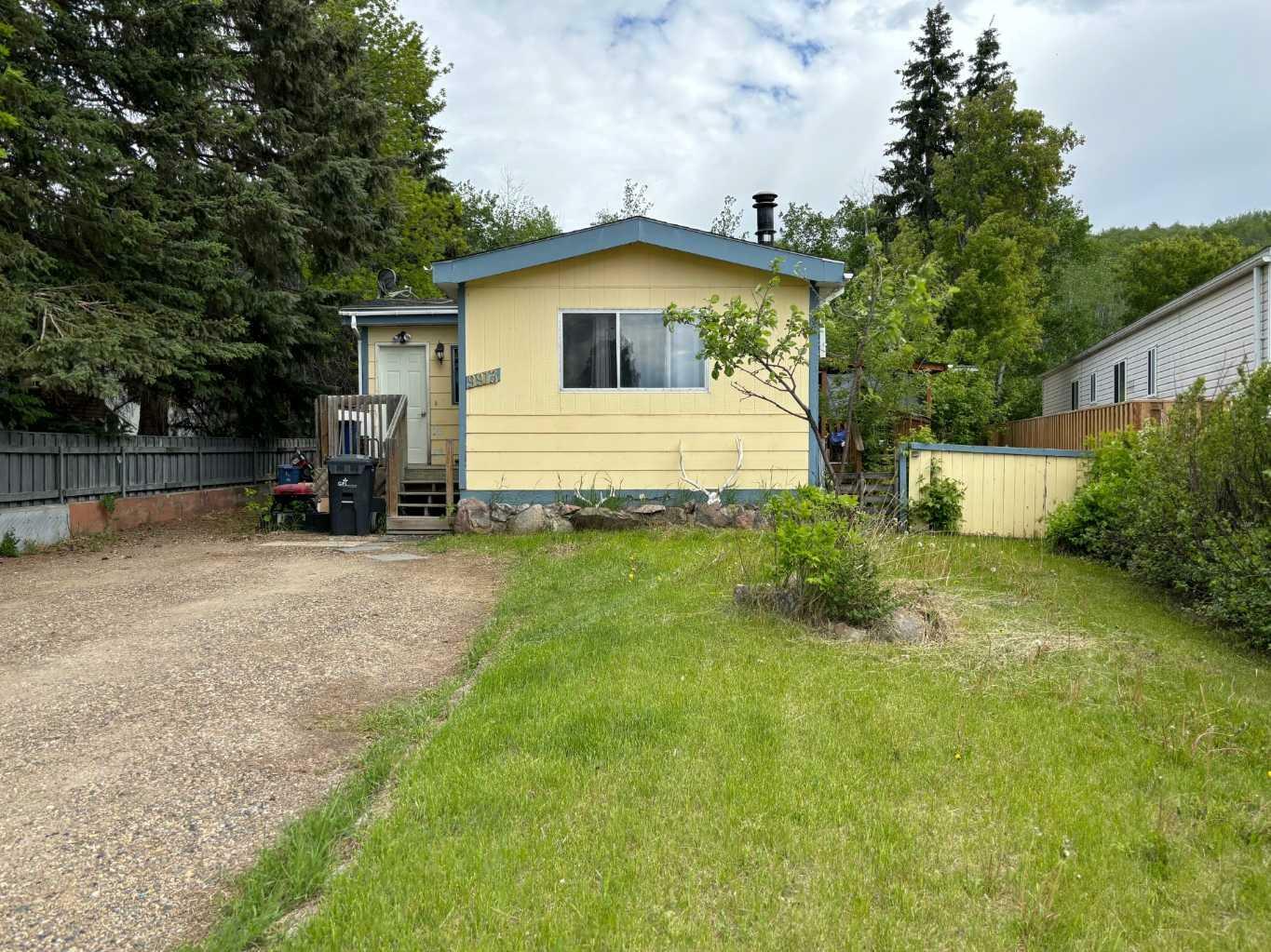 Property Photo:  9913 80 Avenue  AB T8S 1A9 