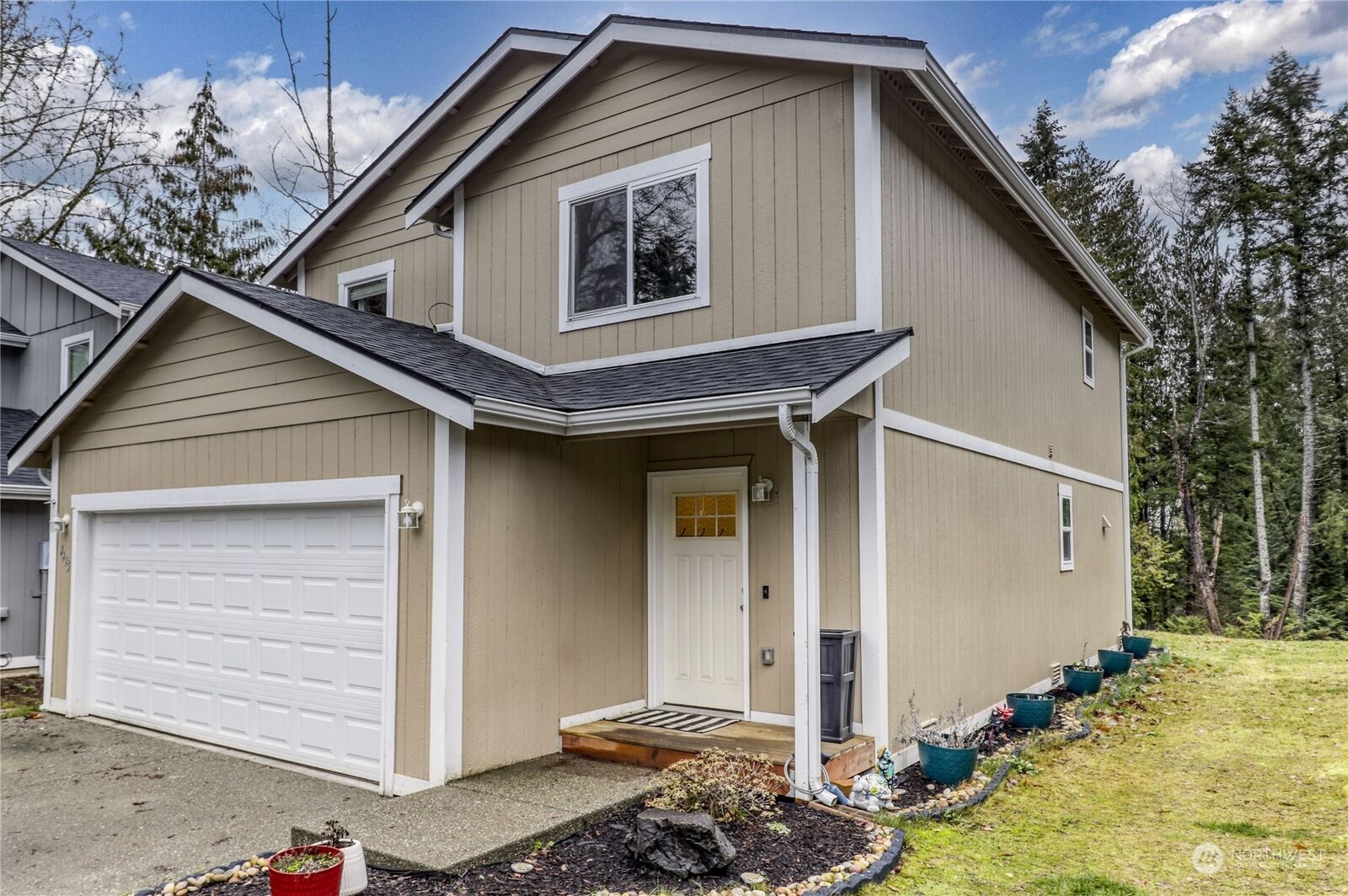 Property Photo: 7225 E Last Refuge Way WA 98366