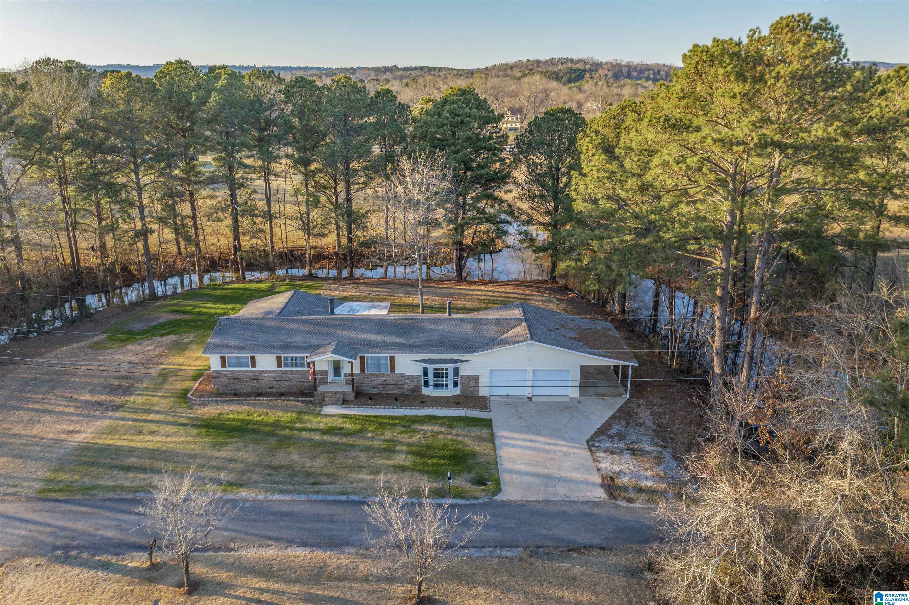 Property Photo:  410 Cove Creek Road  AL 35903 