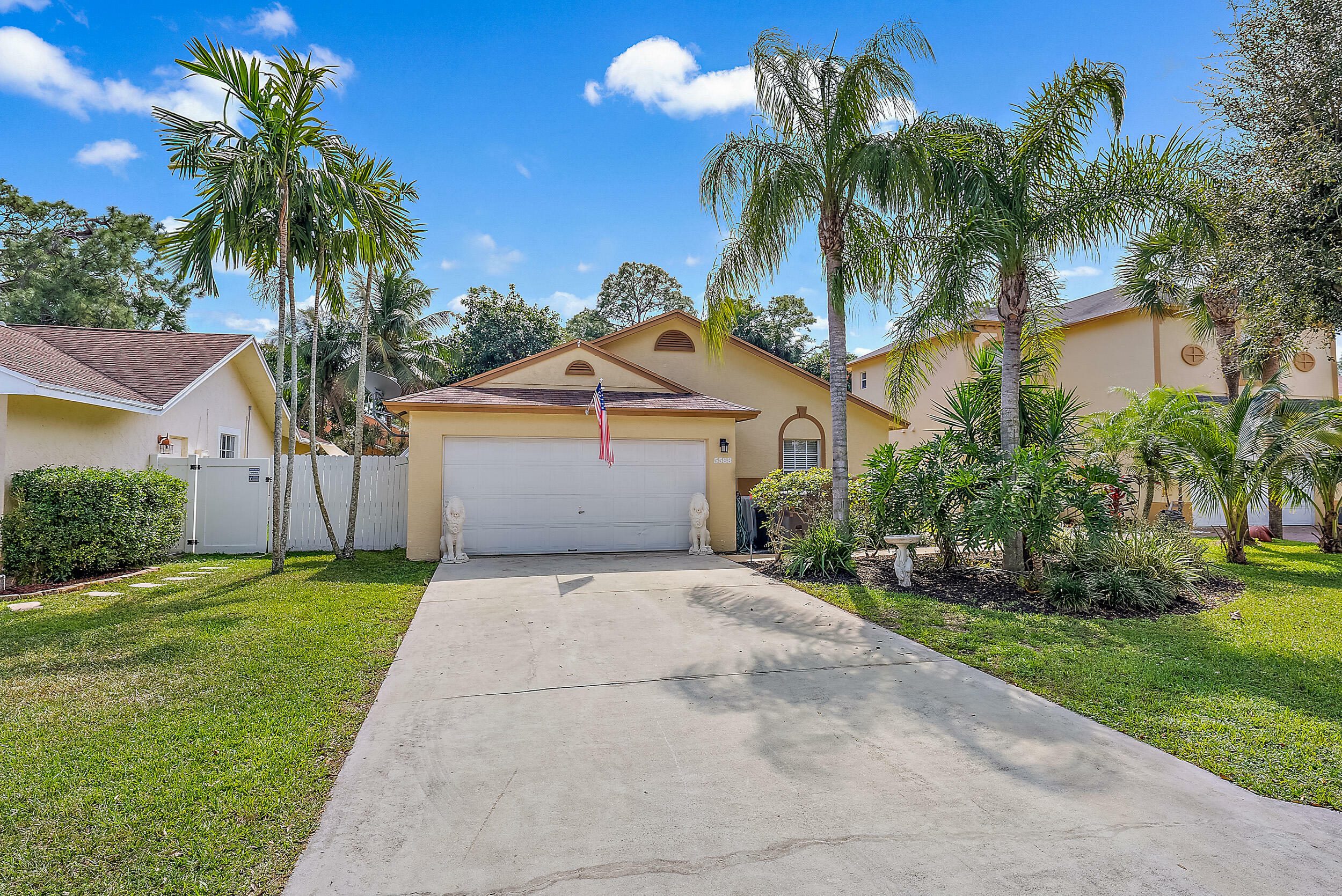 Property Photo:  5588 Rambler Rose Way  FL 33415 