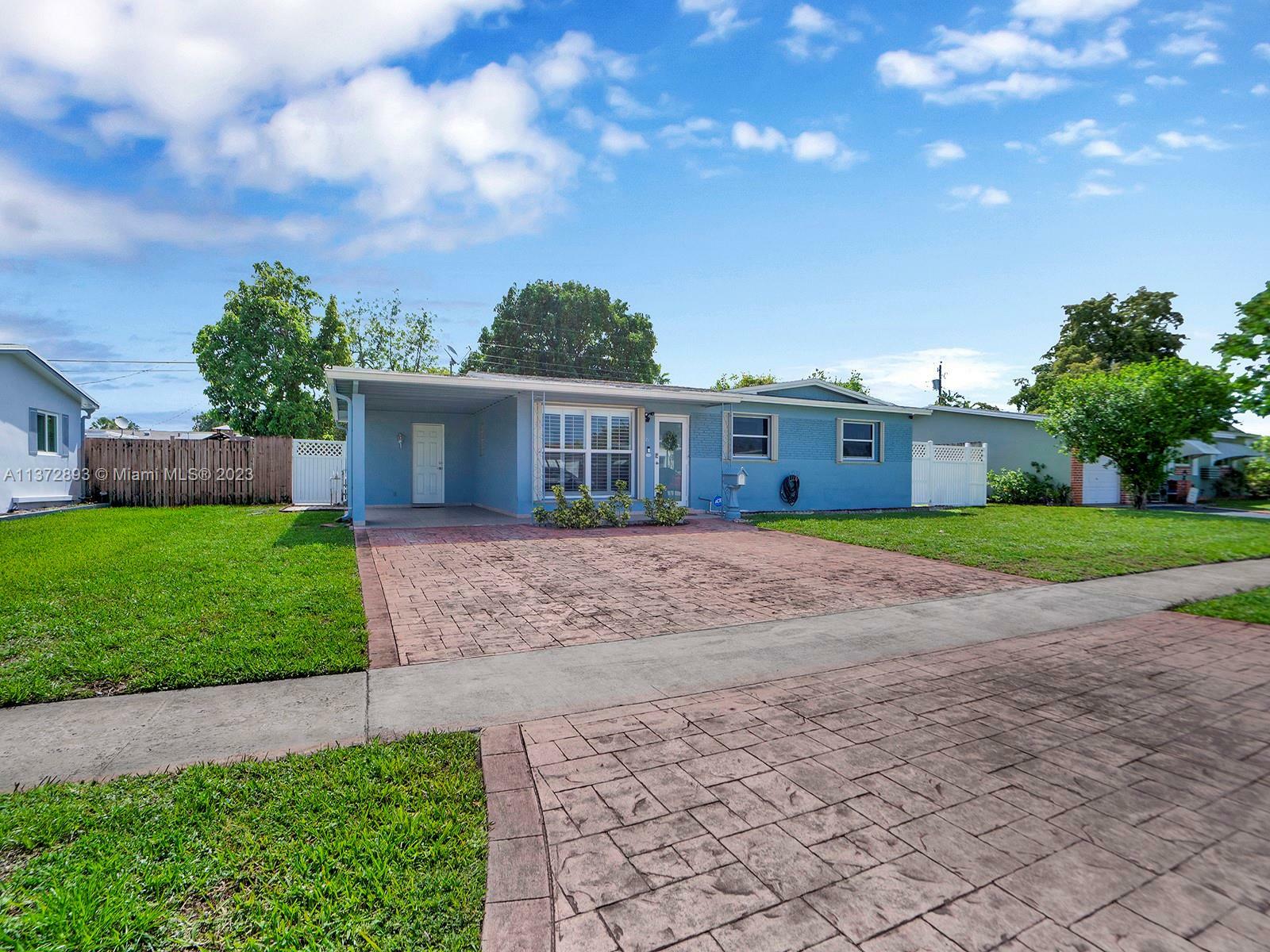 Property Photo:  671 SW 67th Ter  FL 33023 