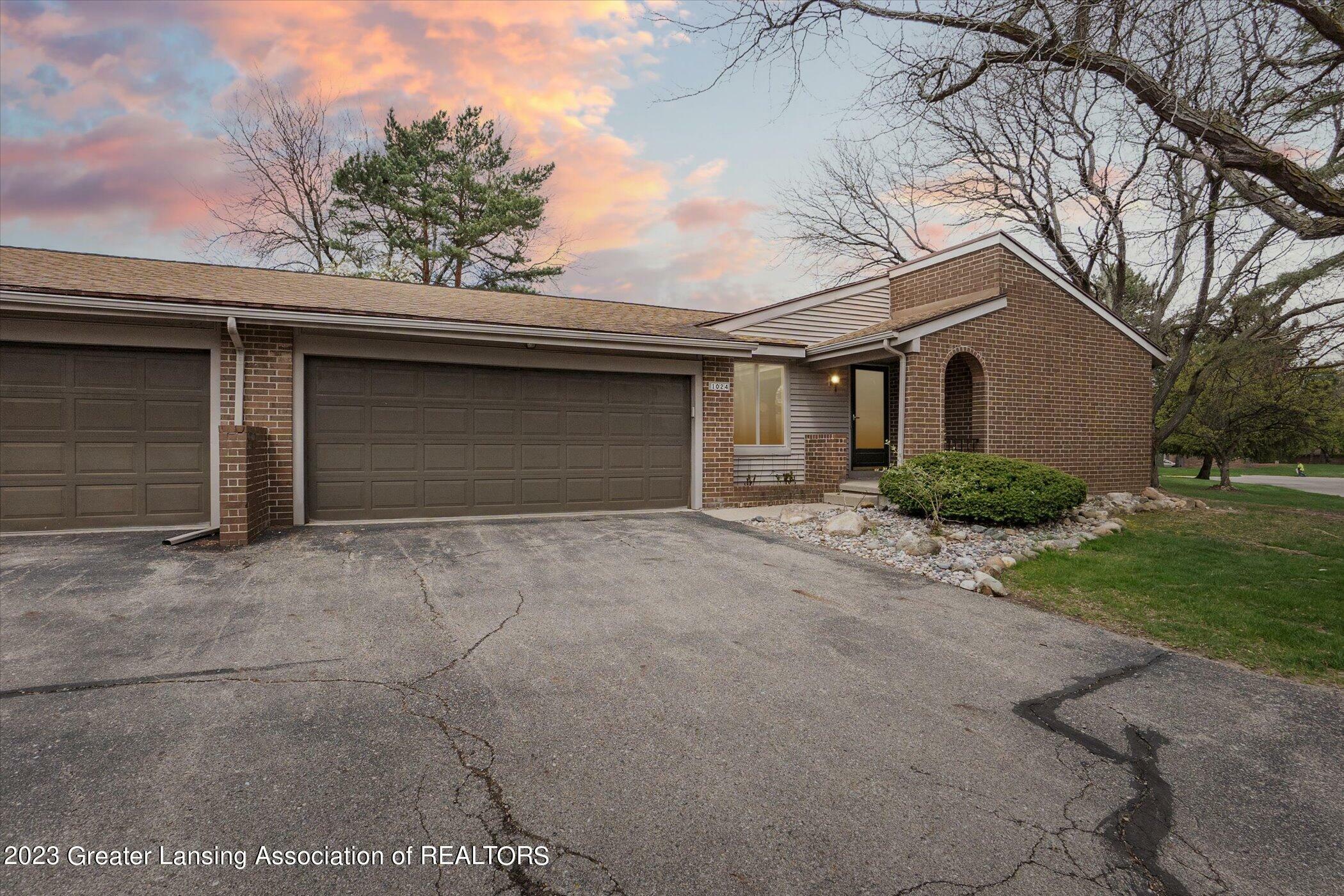 Property Photo:  1024 Grenoble Circle  MI 48917 