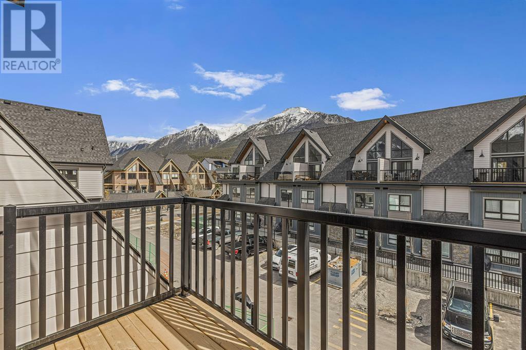 Property Photo:  113 Kananaskis Way  AB T1W2X2 