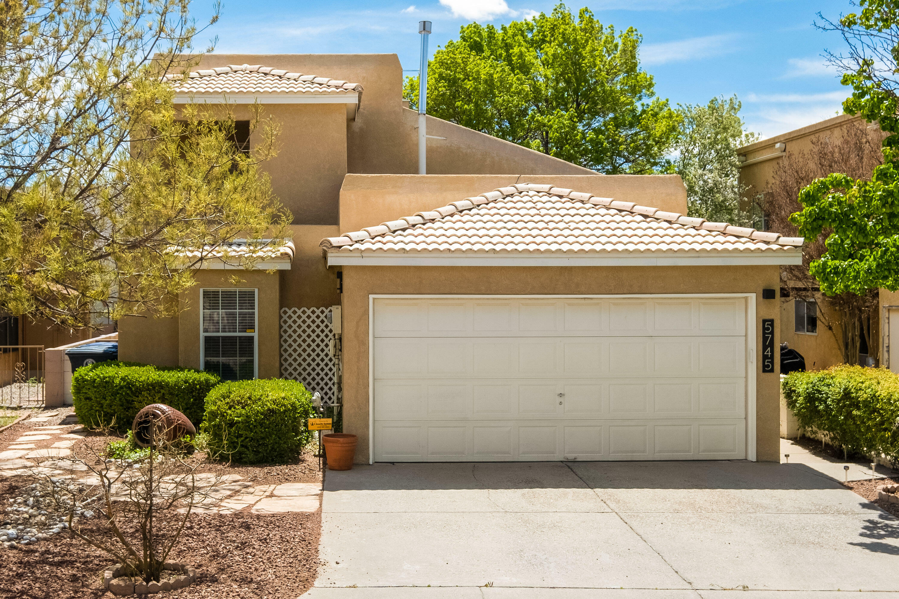 Property Photo: 5745 Bartonwood Place NE NM 87111