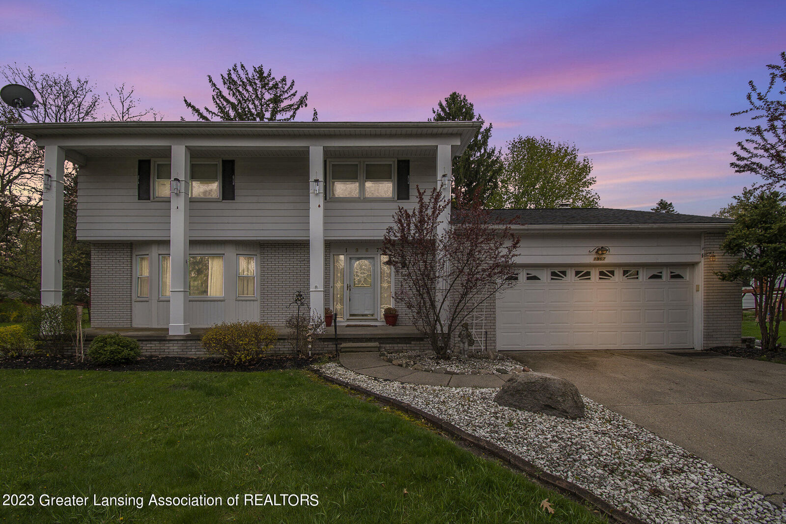 Property Photo:  1967 Kingswood Circle  MI 48864 