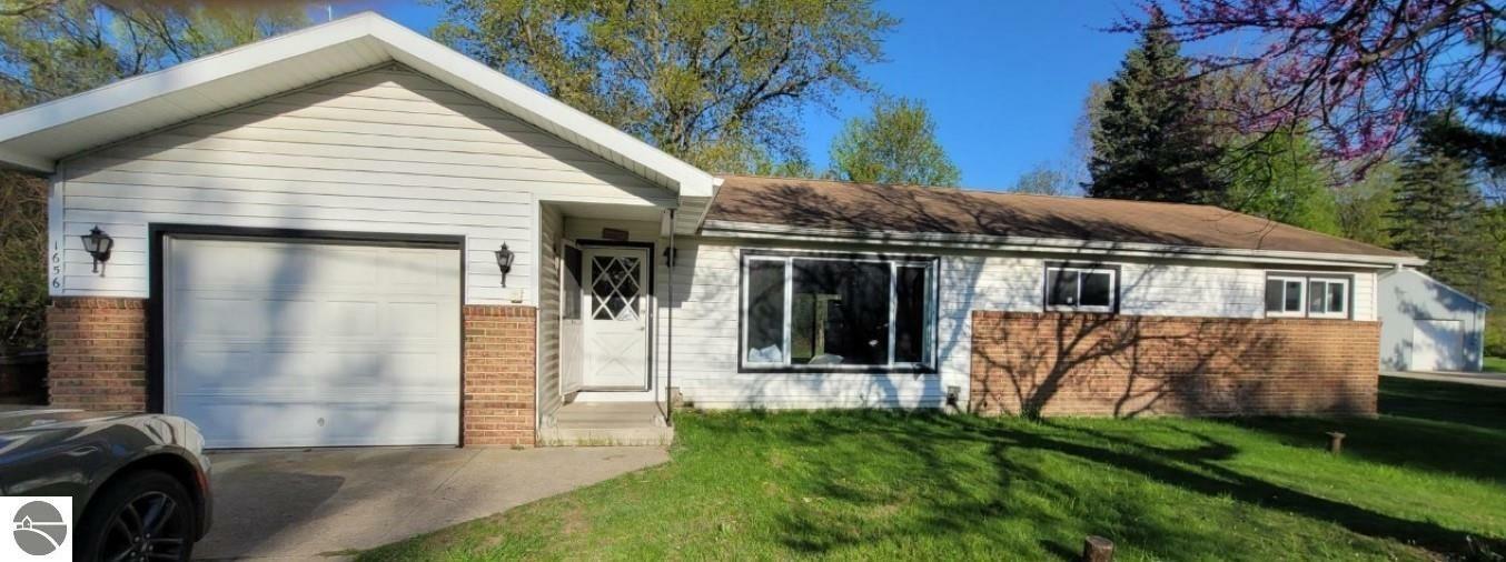 Property Photo:  1656 Belmont Drive  MI 48858 