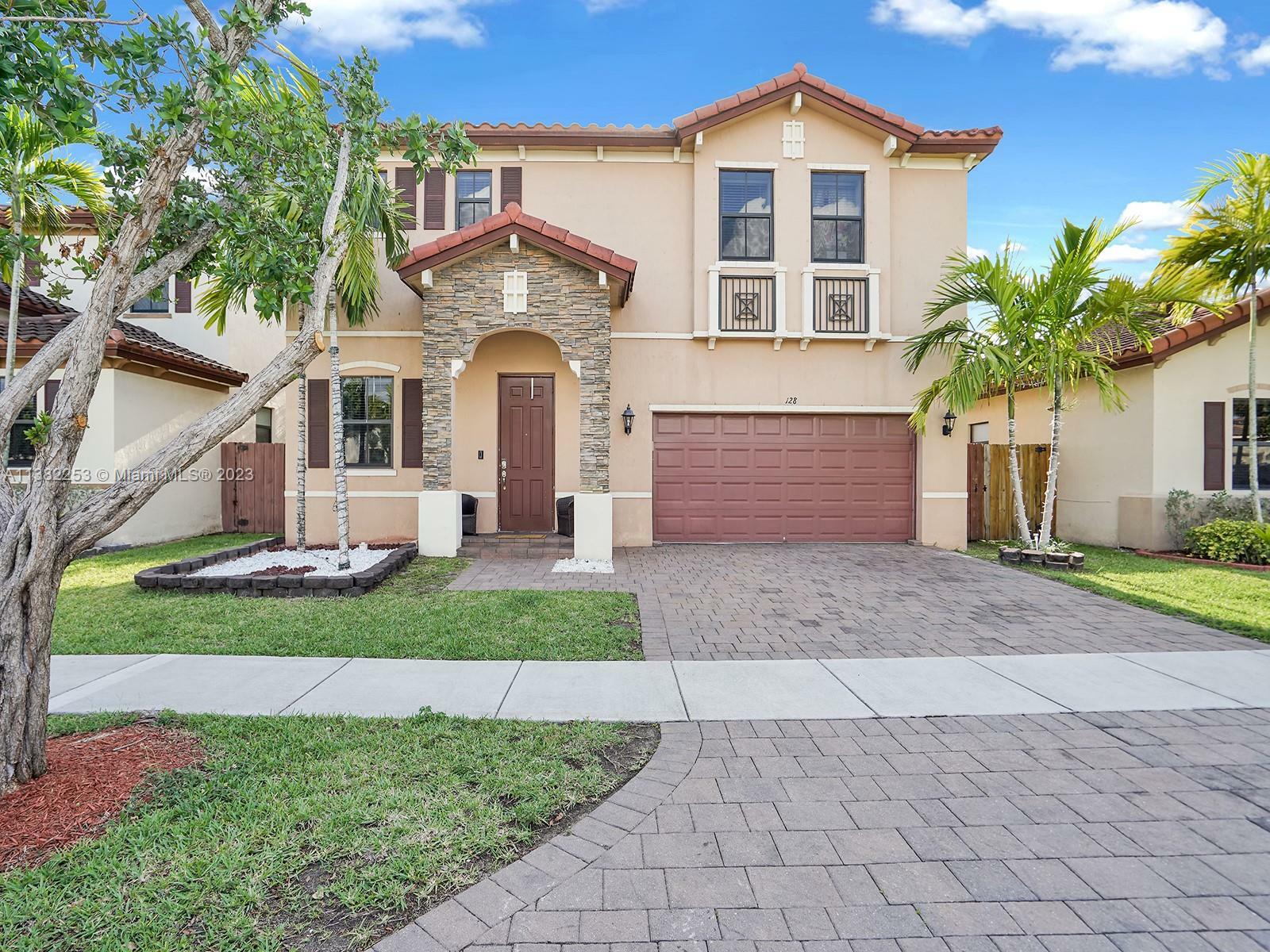 Property Photo:  128 NE 27th Ave .  FL 33033 