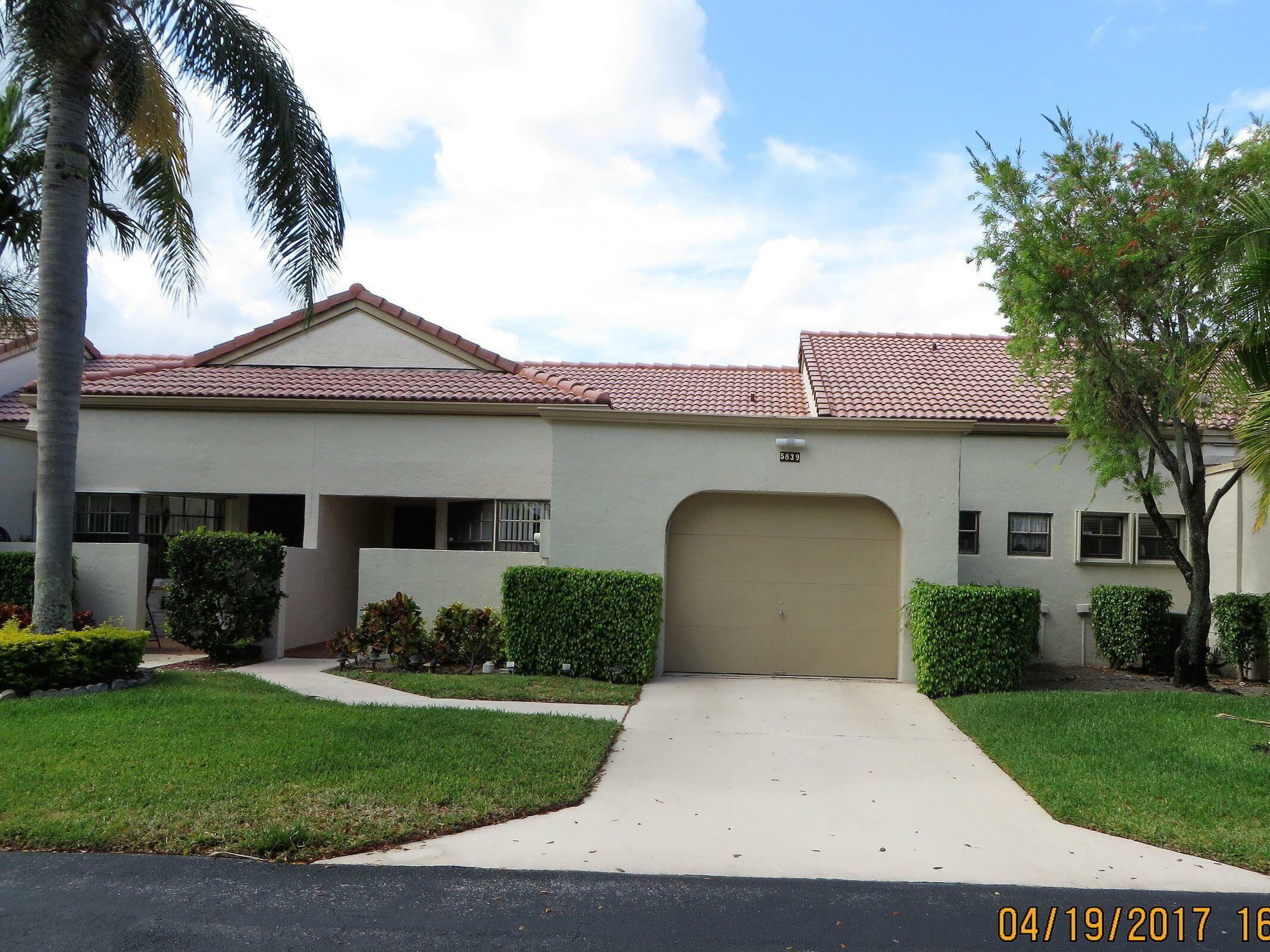 Property Photo: 5839 Parkwalk Circle W FL 33472