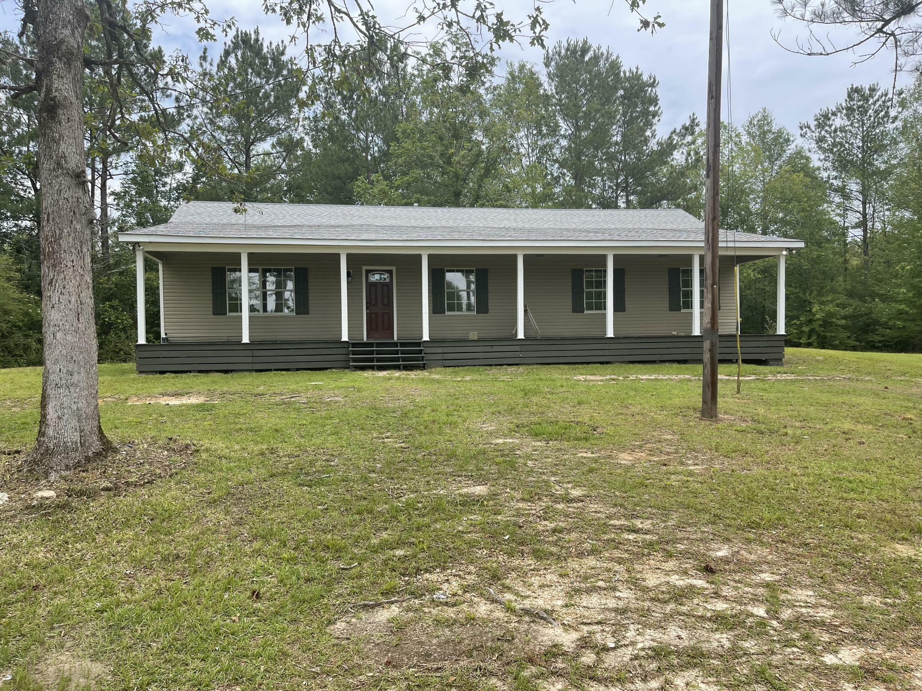 Property Photo:  211 Seminary Lake Mike Conner Rd.  MS 39428 