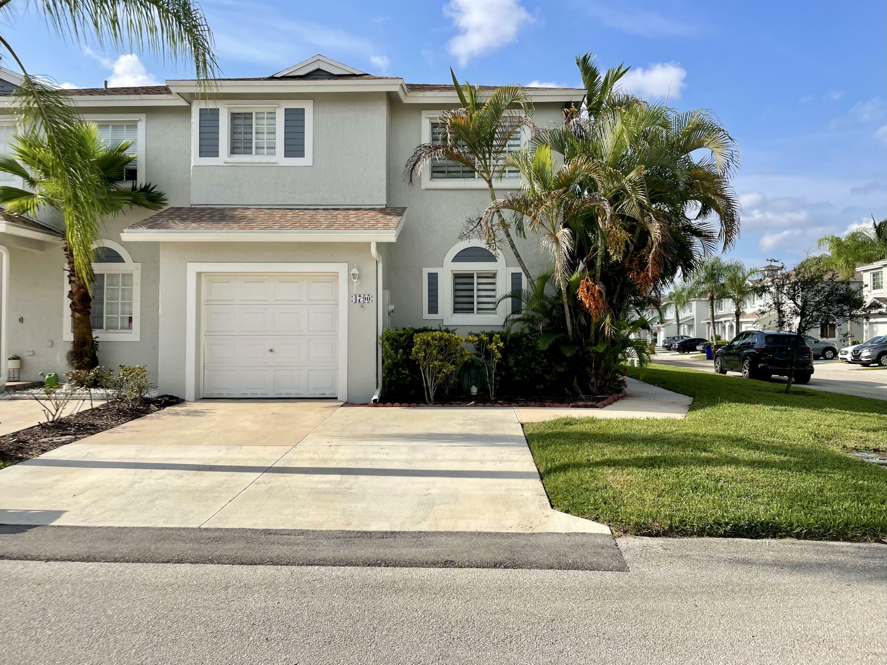 Property Photo:  4790 SW 14 Street 4790  FL 33442 