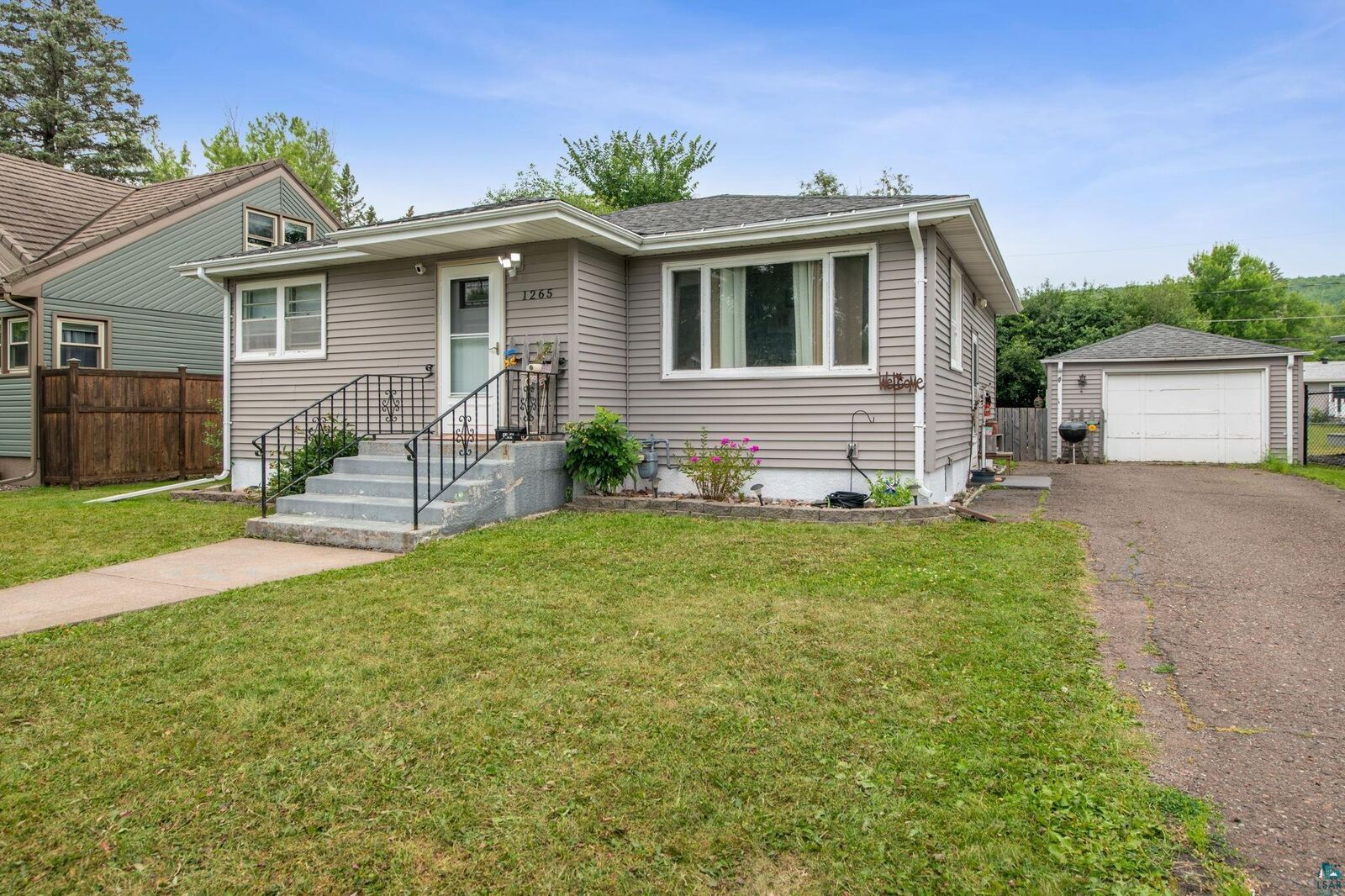 Property Photo:  1265 92nd Ave W  MN 55808 