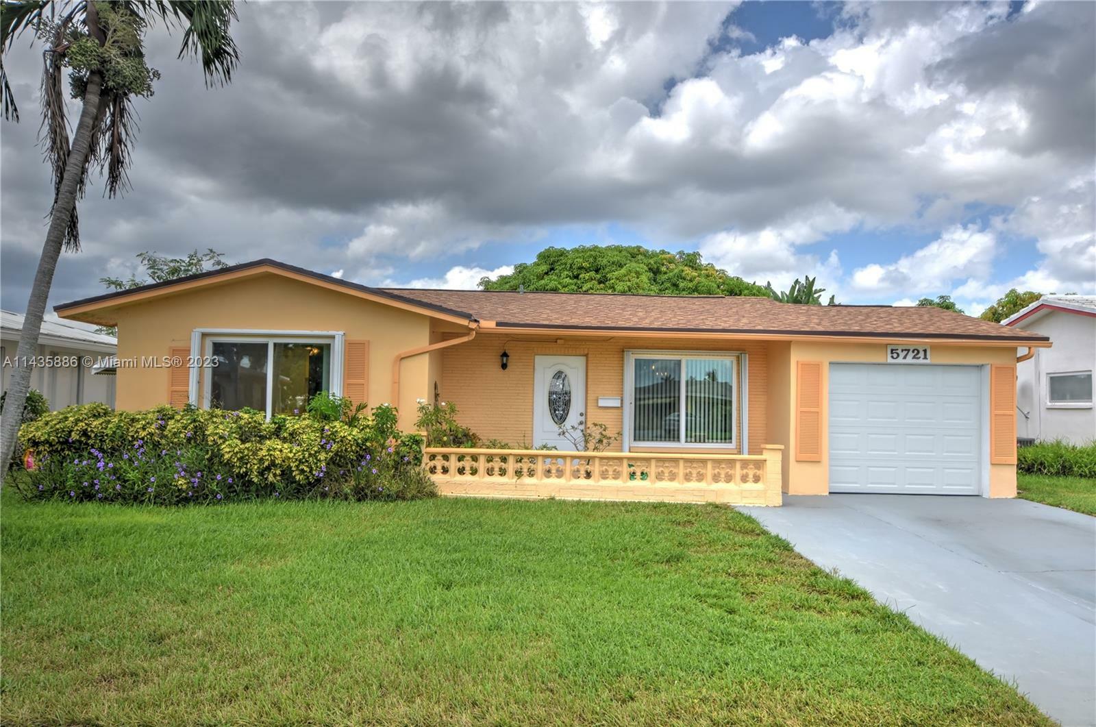 Property Photo:  5721 NW 68th Ave  FL 33321 