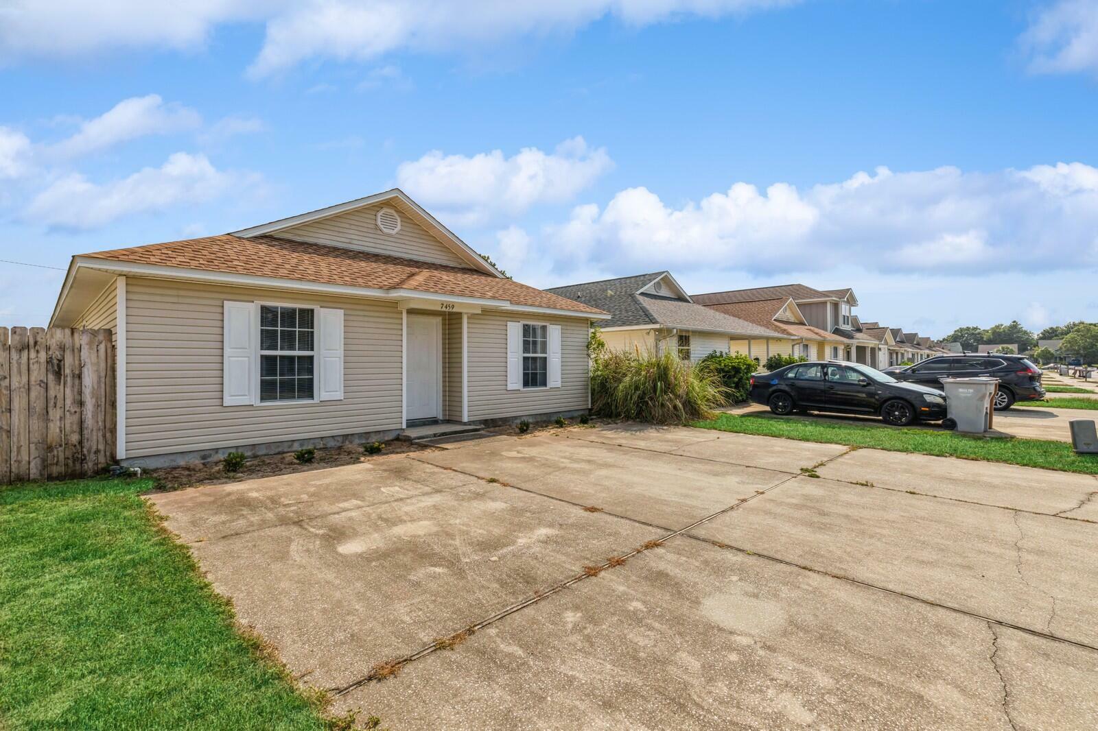 Property Photo:  7459 Harvest Village Court  FL 32566 