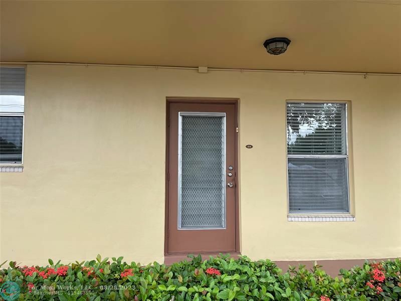 Property Photo:  5800 NW 64th Ave 104  FL 33319 