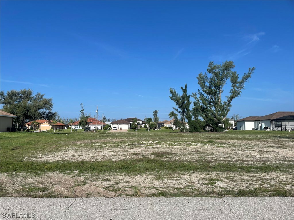 Property Photo:  706 NW 38th Avenue  FL 33993 