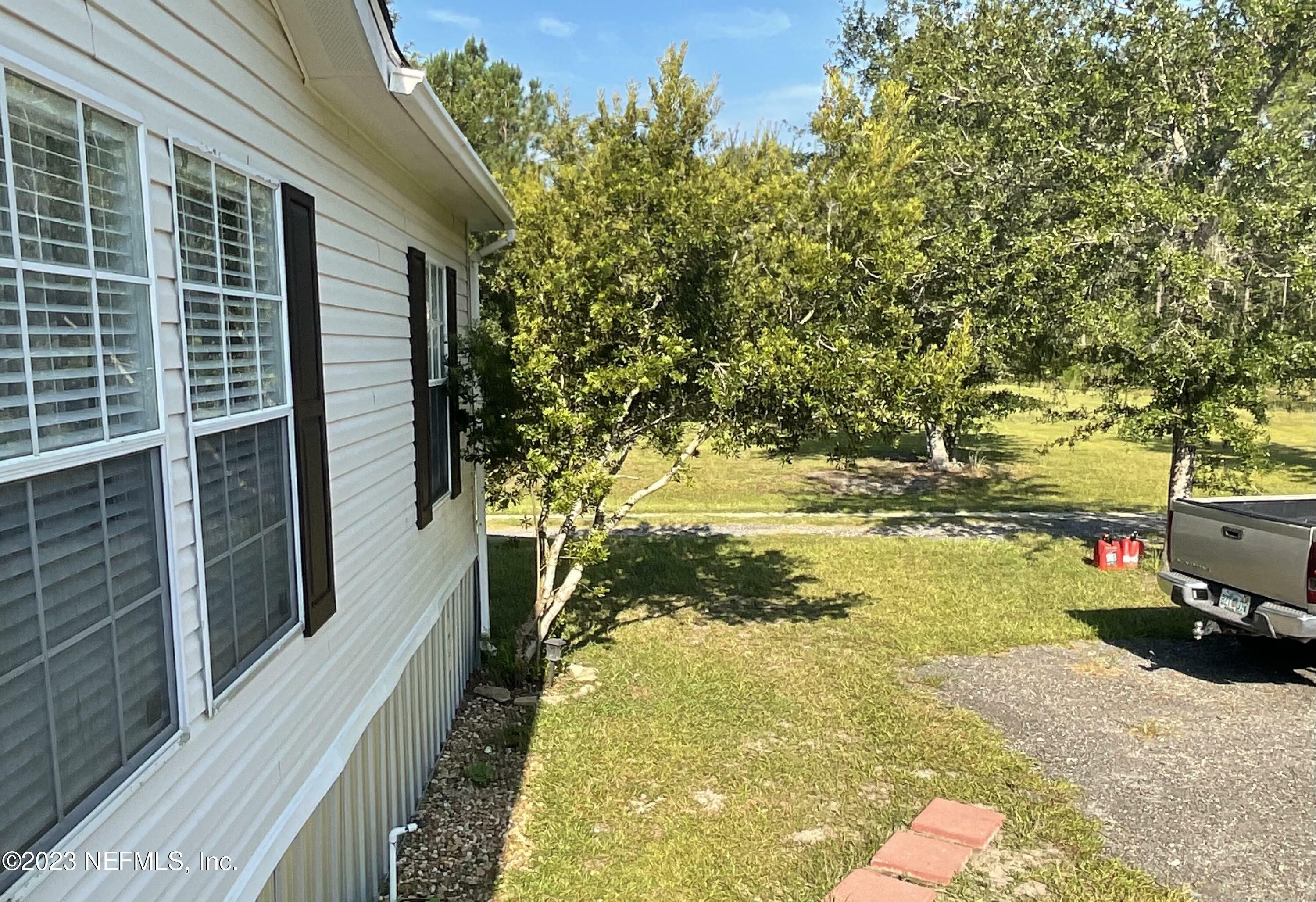 Property Photo:  4680 SE 92nd Street  FL 32091 