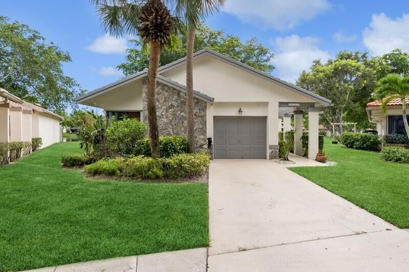 Property Photo: 10578 Fern Tree Way FL 33436
