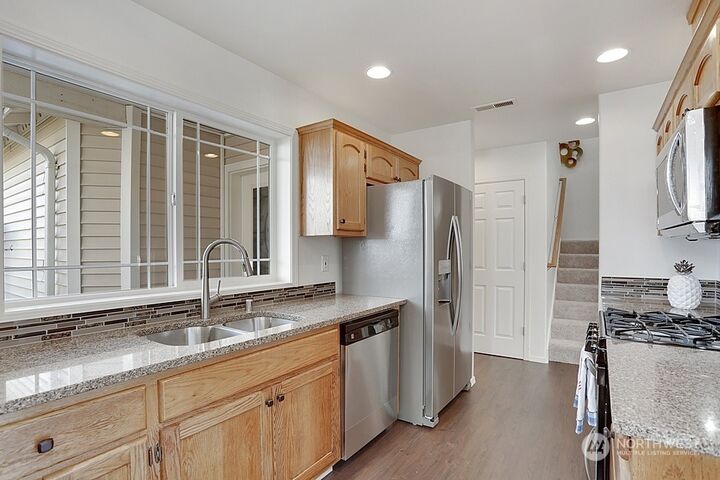 Property Photo:  3225 156th Street SW 6  WA 98087 