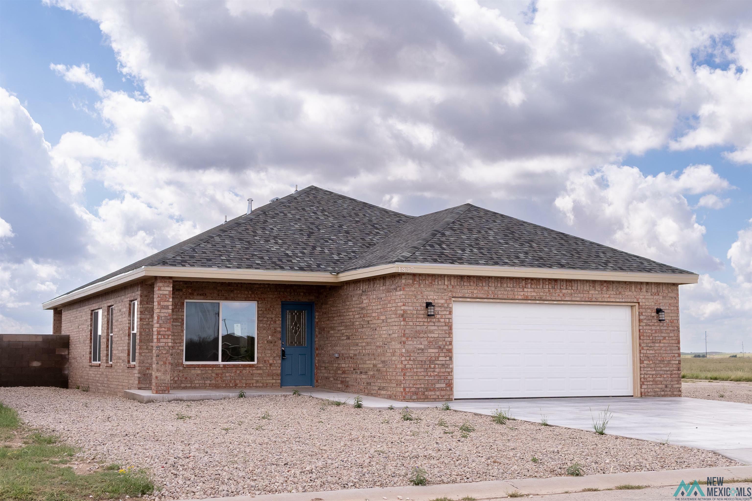 Property Photo: 1837 Quail Wood Drive NM 88130