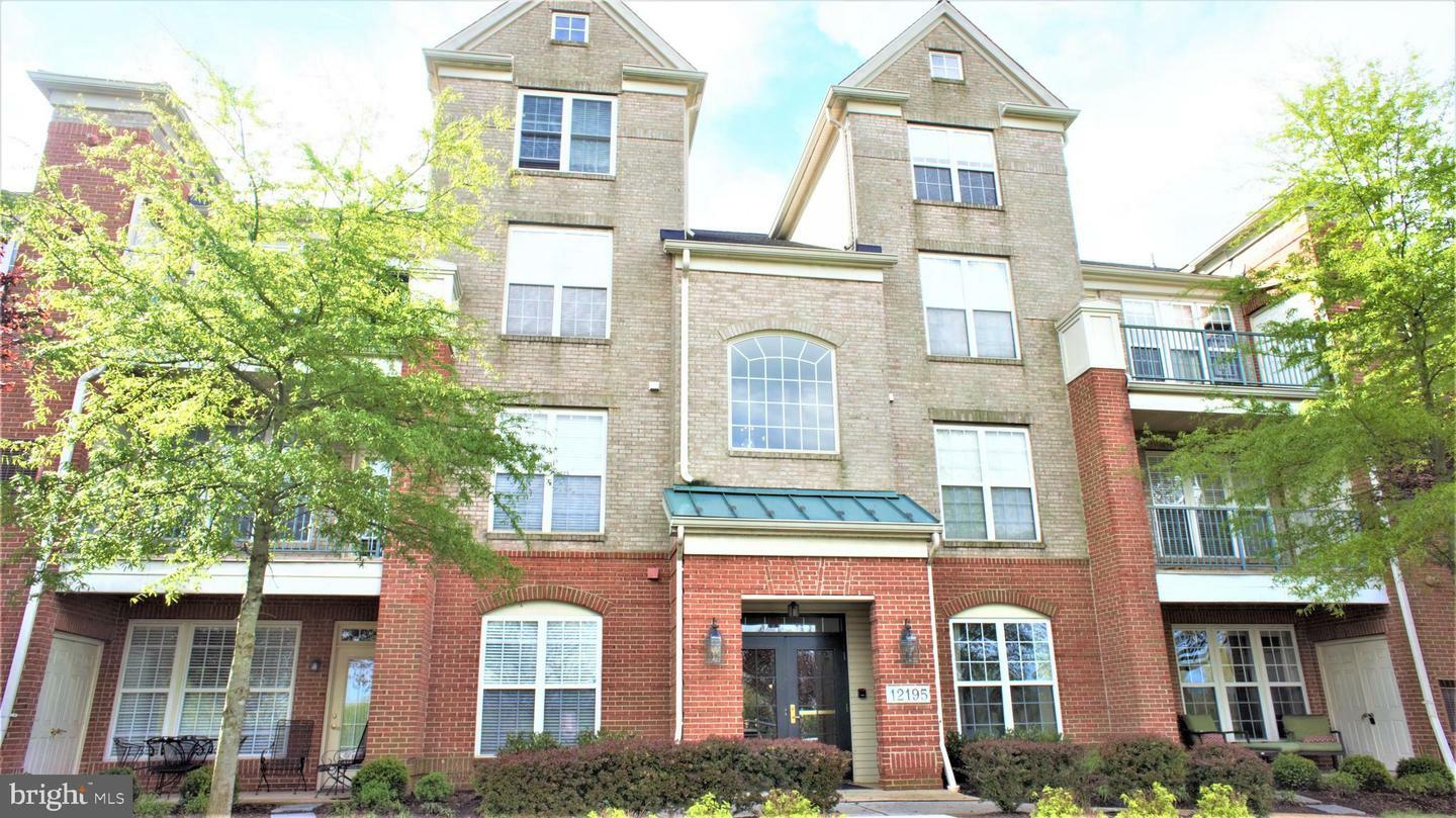 Property Photo:  12195 Abington Hall Place 201  VA 20190 