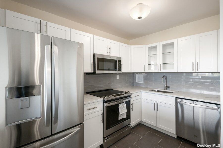 Property Photo: 7-24 166th Street 9C NY 11357