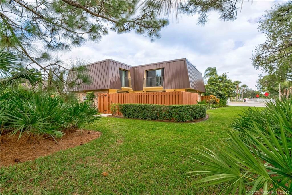 Property Photo: 5668 SE Windsong Lane FL 34997