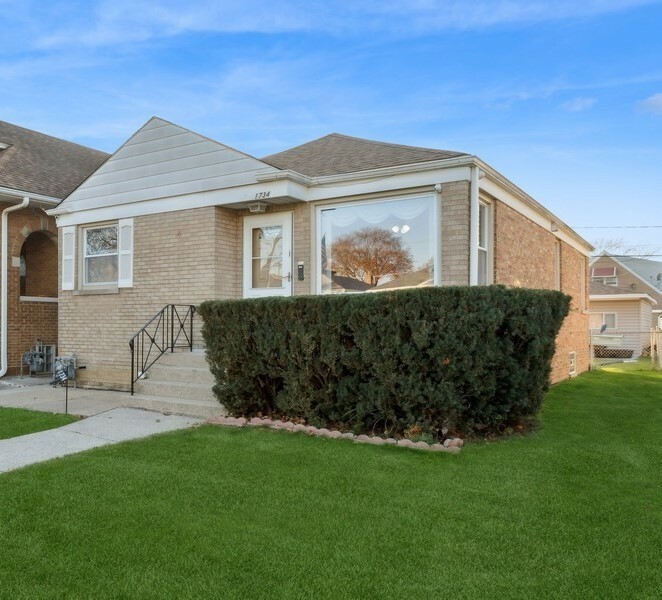 Property Photo: 1734 N 22nd Avenue IL 60160
