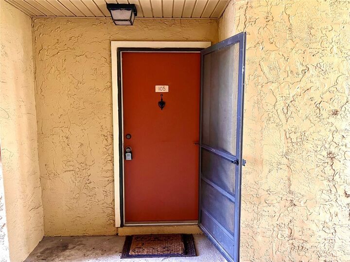 Property Photo:  666 Kenwick Circle 105  FL 32707 