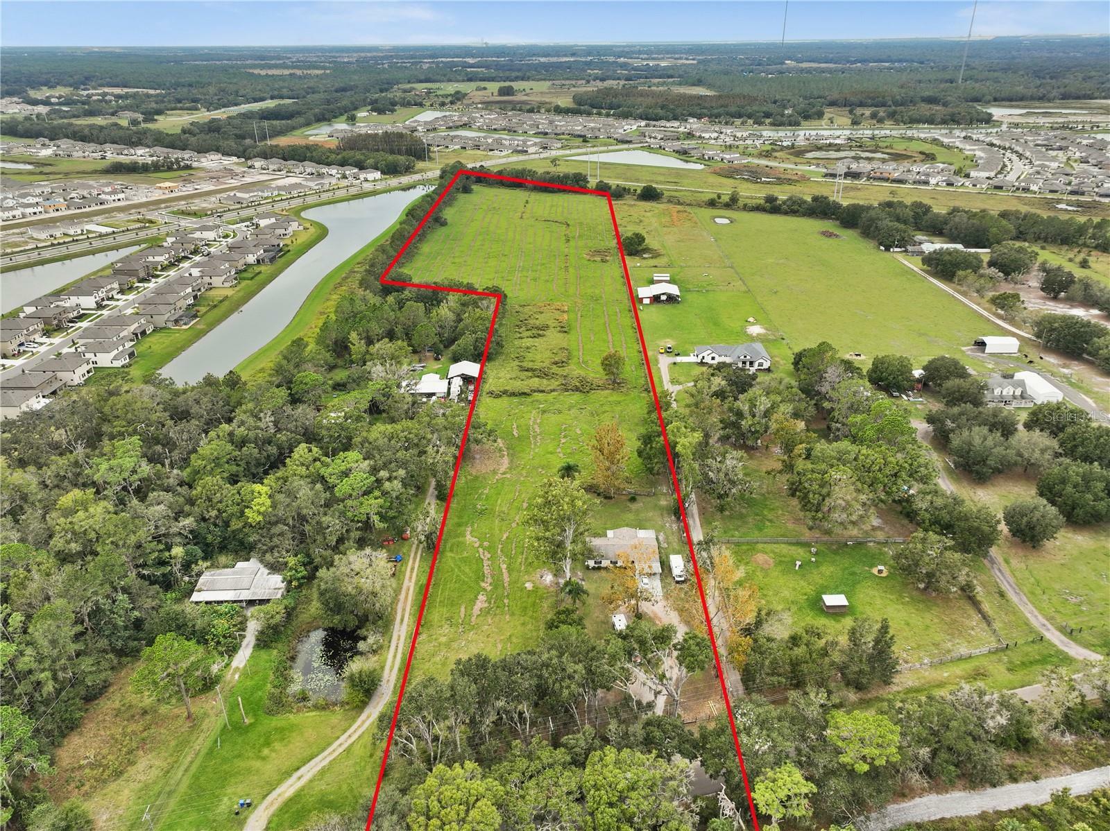 Property Photo:  12631 Hobson Simmons Road  FL 33547 