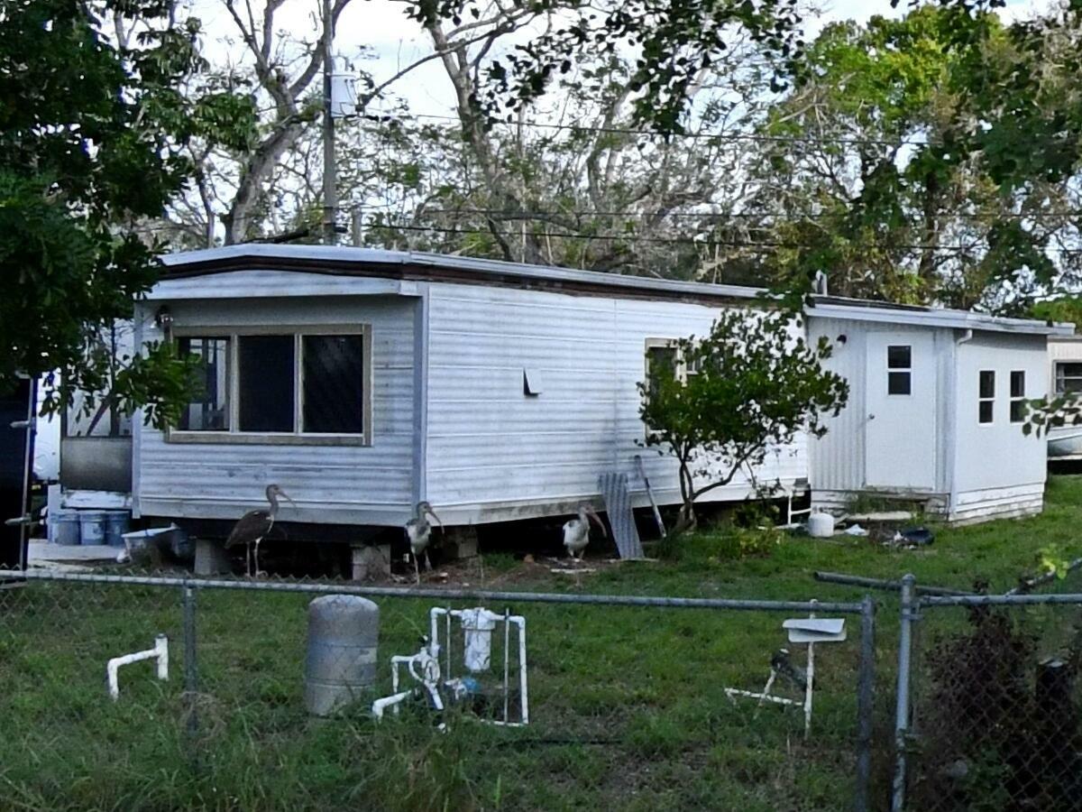 Property Photo: 1208 W Joy Lane FL 34950