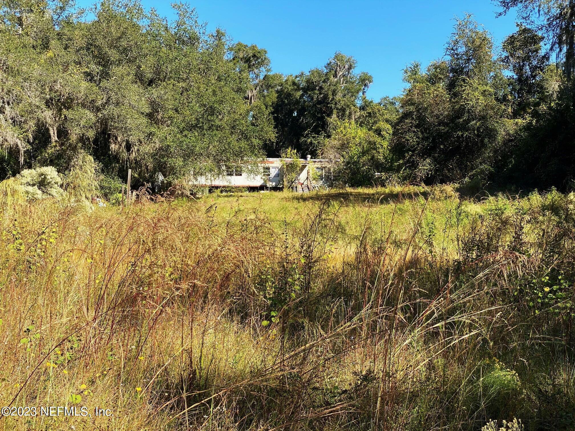 Property Photo:  152 Ranchwood Road  FL 32112 