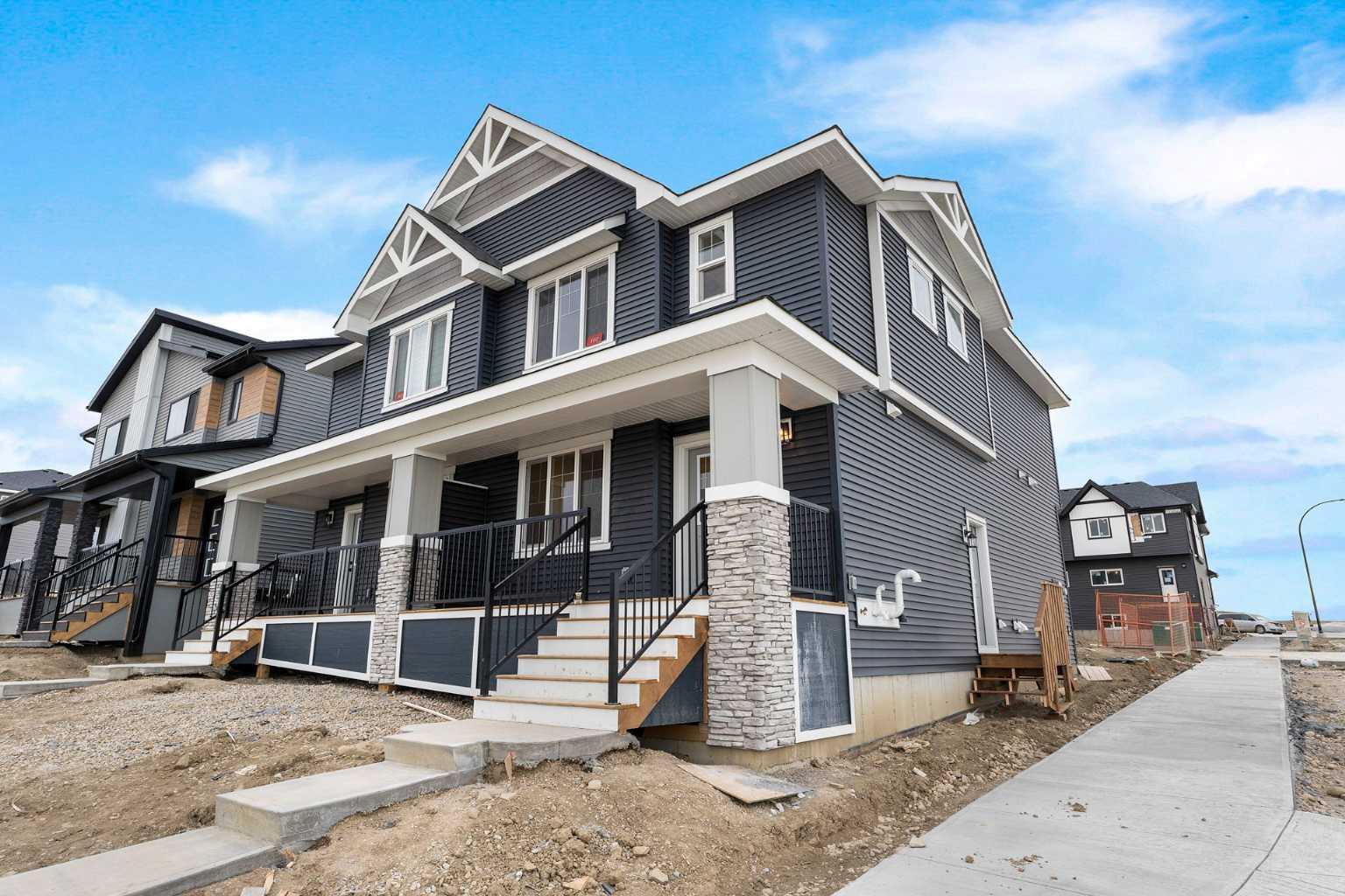 Property Photo: 107 Edith Passage NW AB T3R 2B5