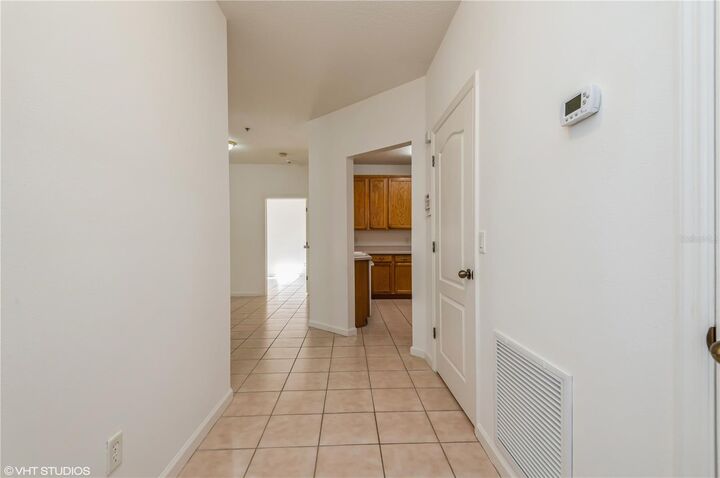 Property Photo:  4897 Cypress Woods Drive 6104  FL 32811 
