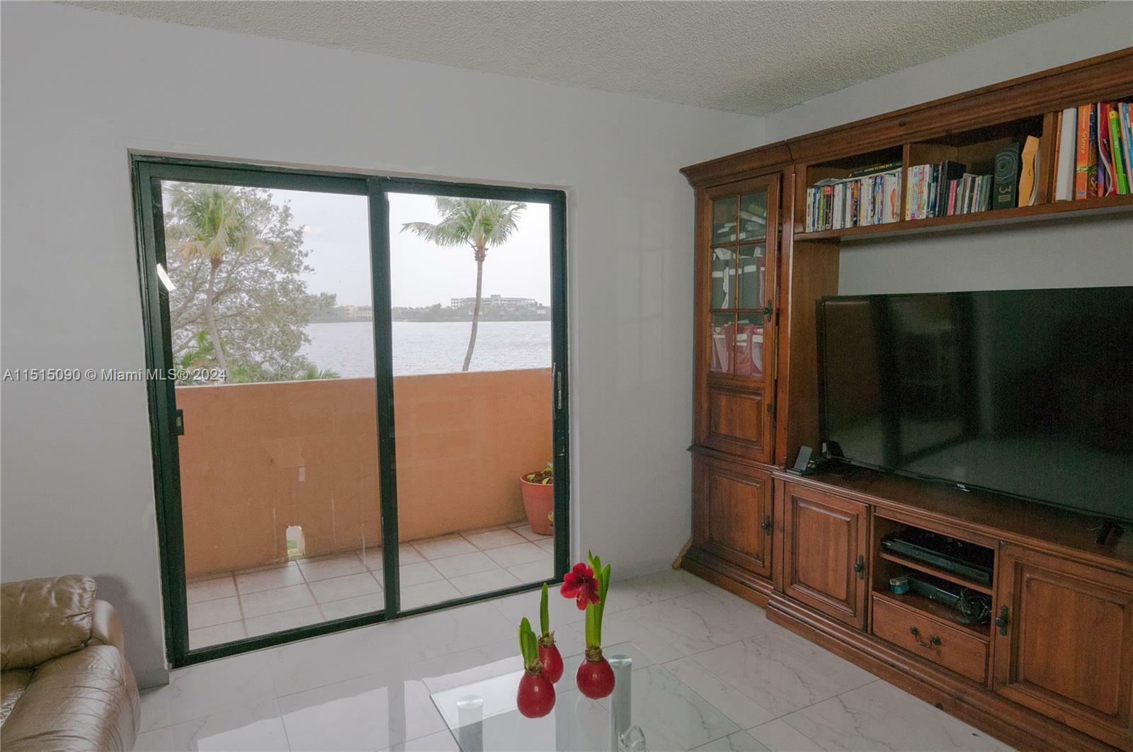 Property Photo:  15969 NW 64th Ave 312  FL 33014 