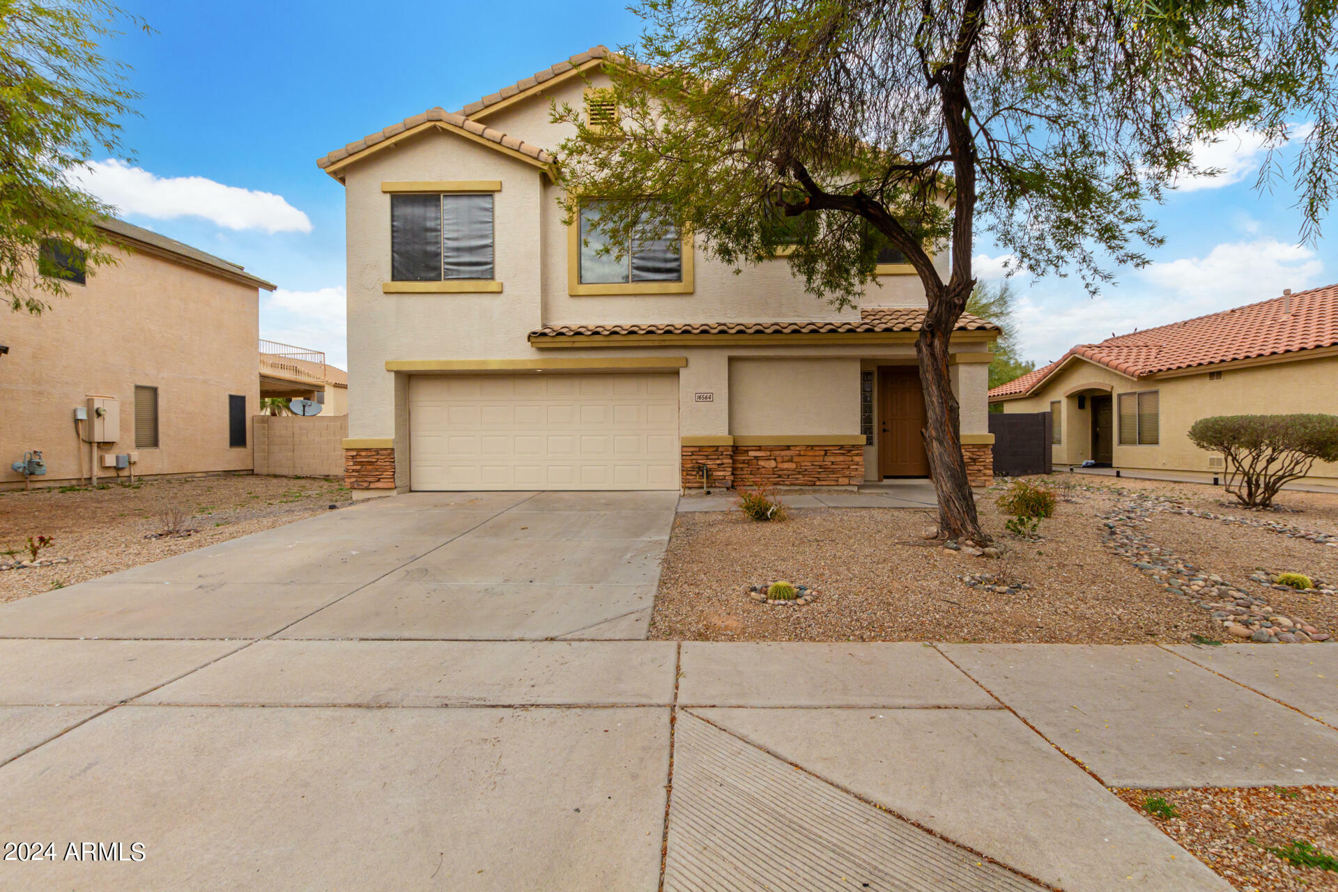 Property Photo:  16564 W Latham Street  AZ 85338 