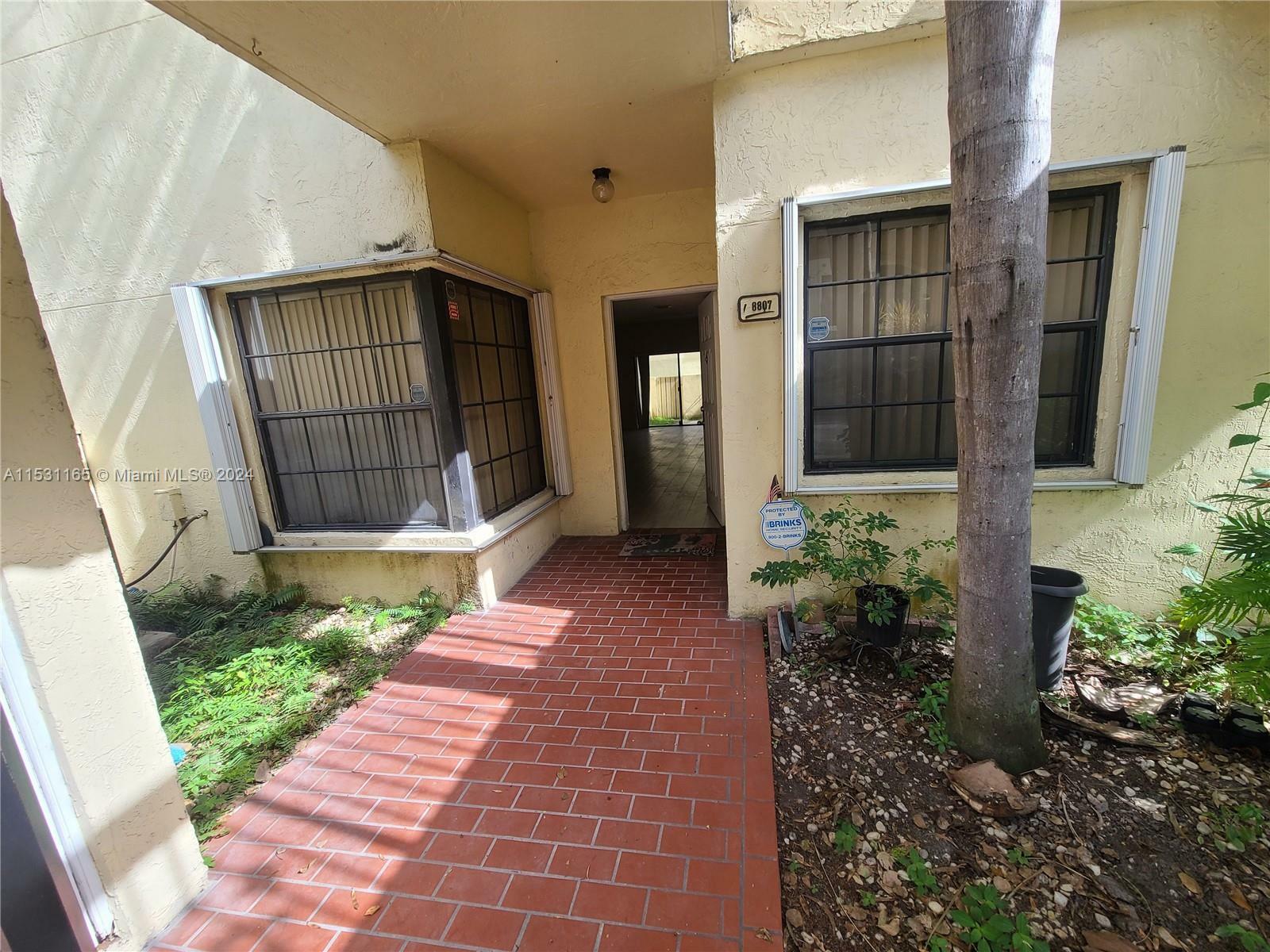 Property Photo:  8807 SW 130th Pl 102  FL 33186 