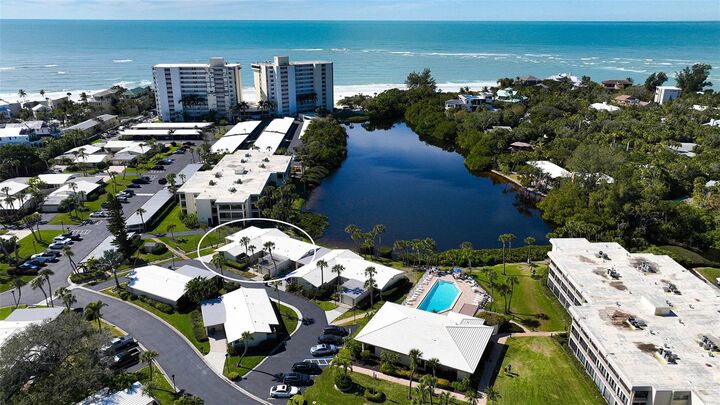 Property Photo:  105 Whispering Sands Drive V-48  FL 34242 