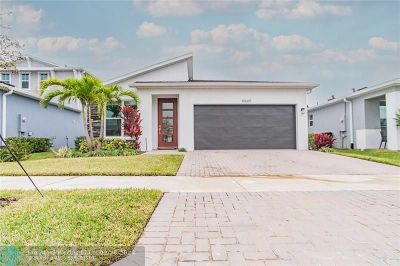 Property Photo:  10669 SW Gloriana St  FL 34987 