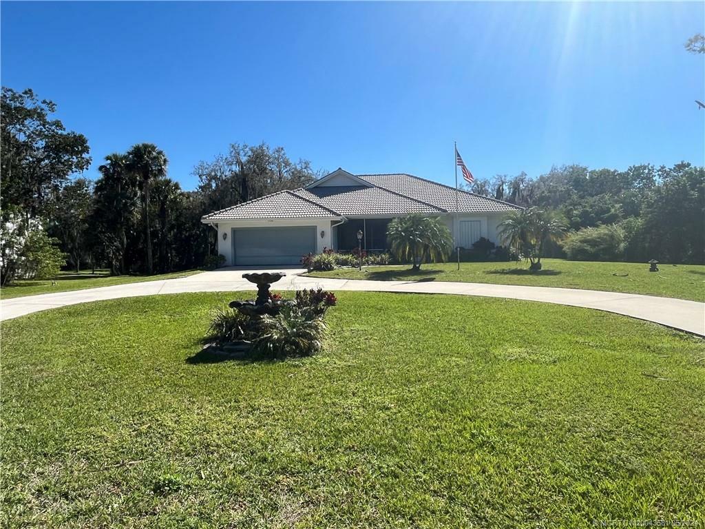 Property Photo:  15246 SW Palm Oak Avenue  FL 34956 