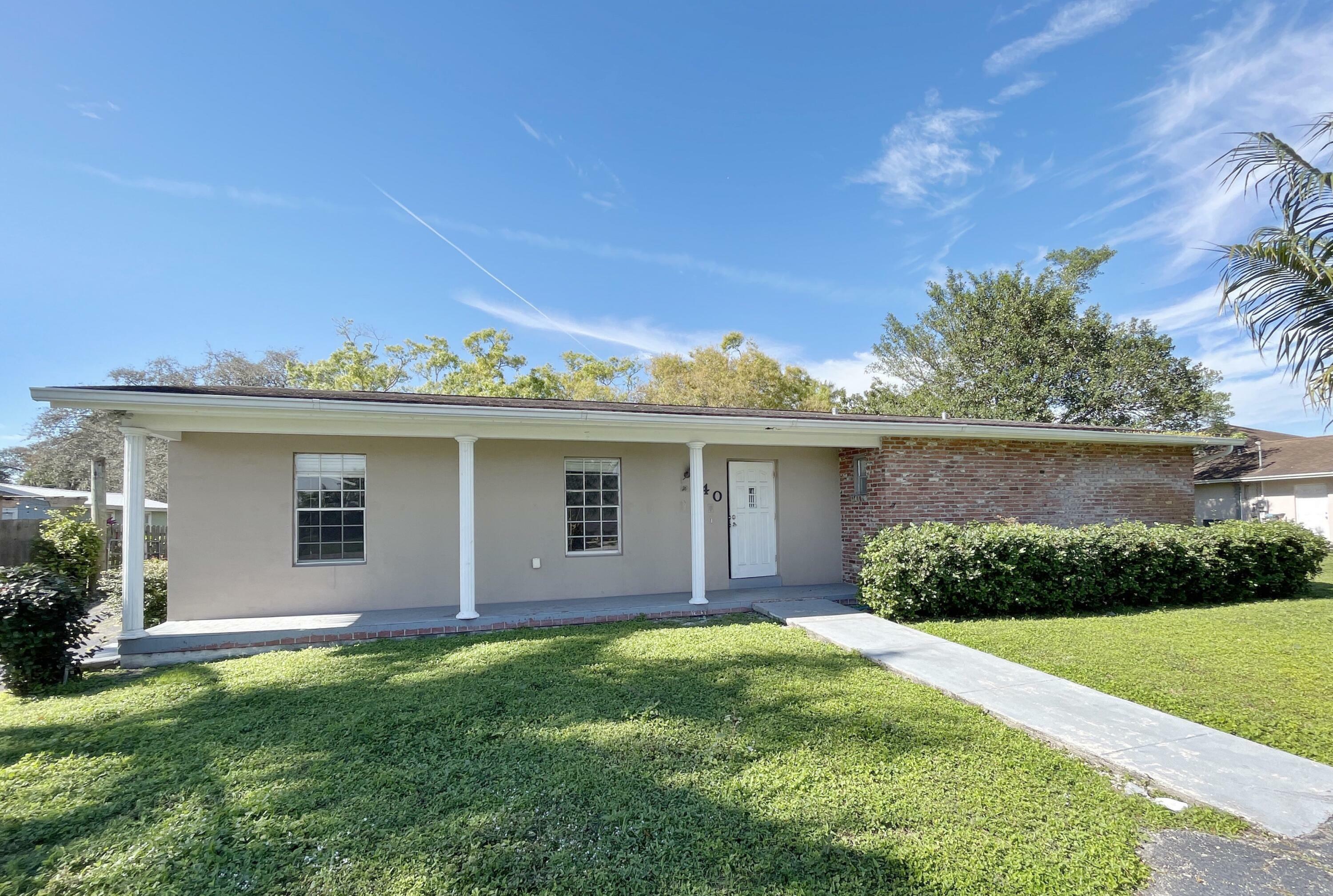 Property Photo: 140 Royal Palm Way FL 33430