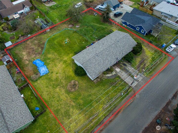 Property Photo:  10613 10615 Sheridan Avenue S  WA 98444 