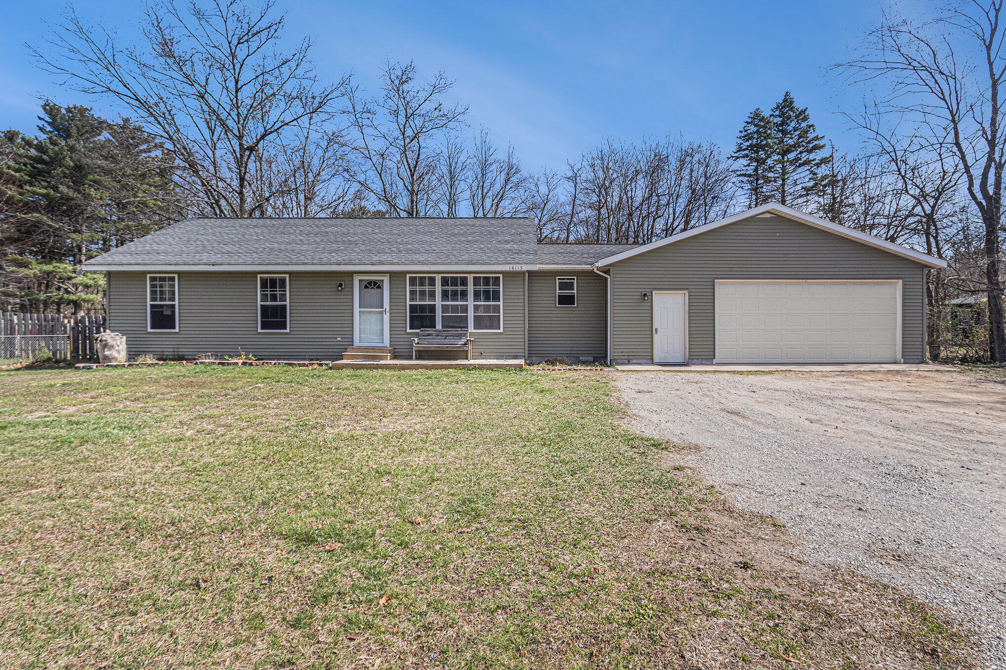 Property Photo:  16113 Mercury Drive  MI 49417 