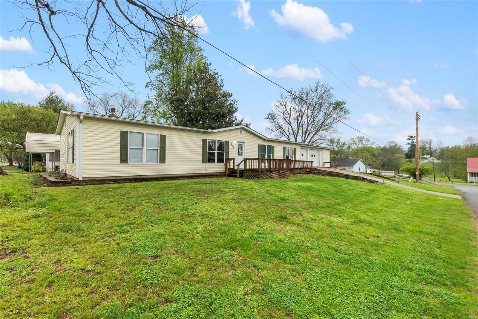 Property Photo:  302 5th Street East  MO 63780 