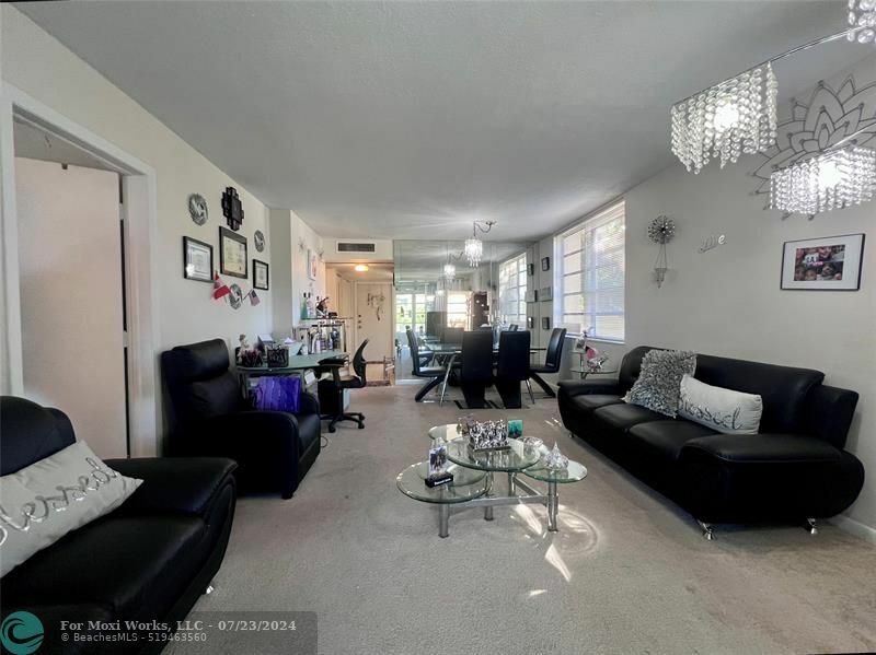 Property Photo:  5980 NW 64th Ave 201  FL 33319 