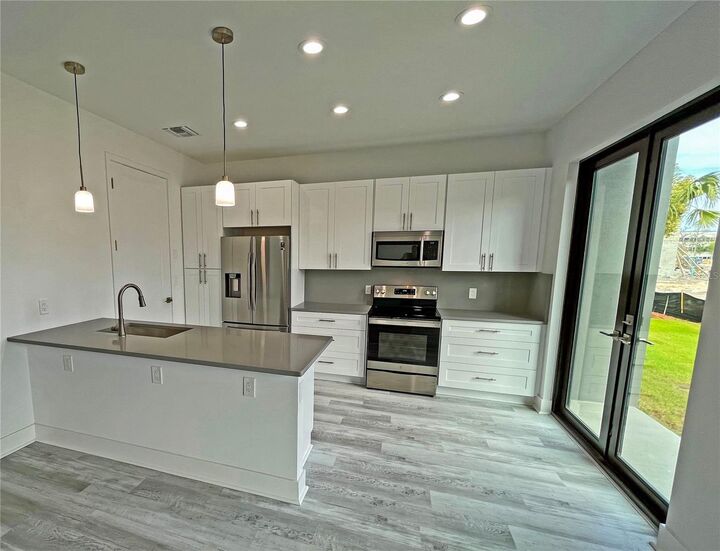 Property Photo: 8717 Palm Ranches Place FL 33614