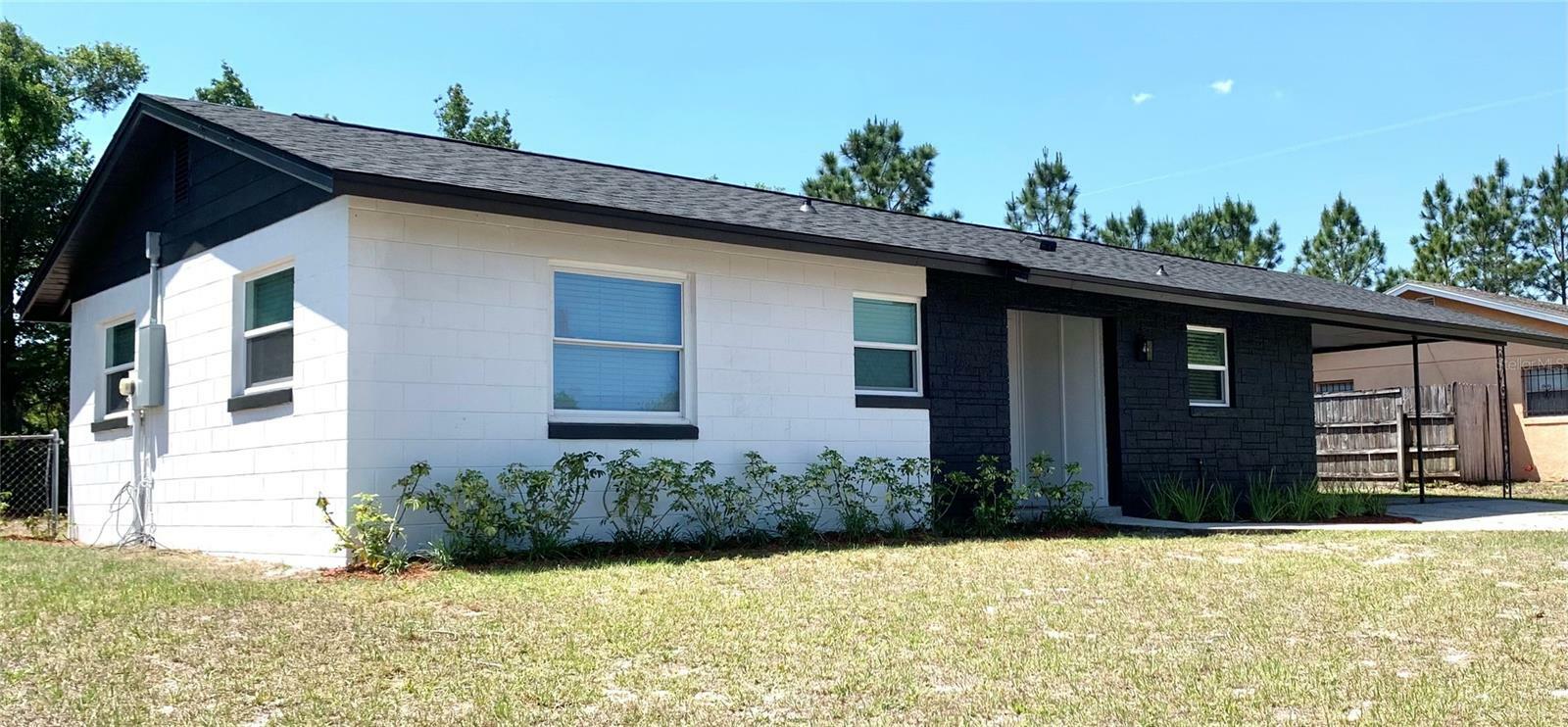 Property Photo:  4856 Victory Drive  FL 32808 
