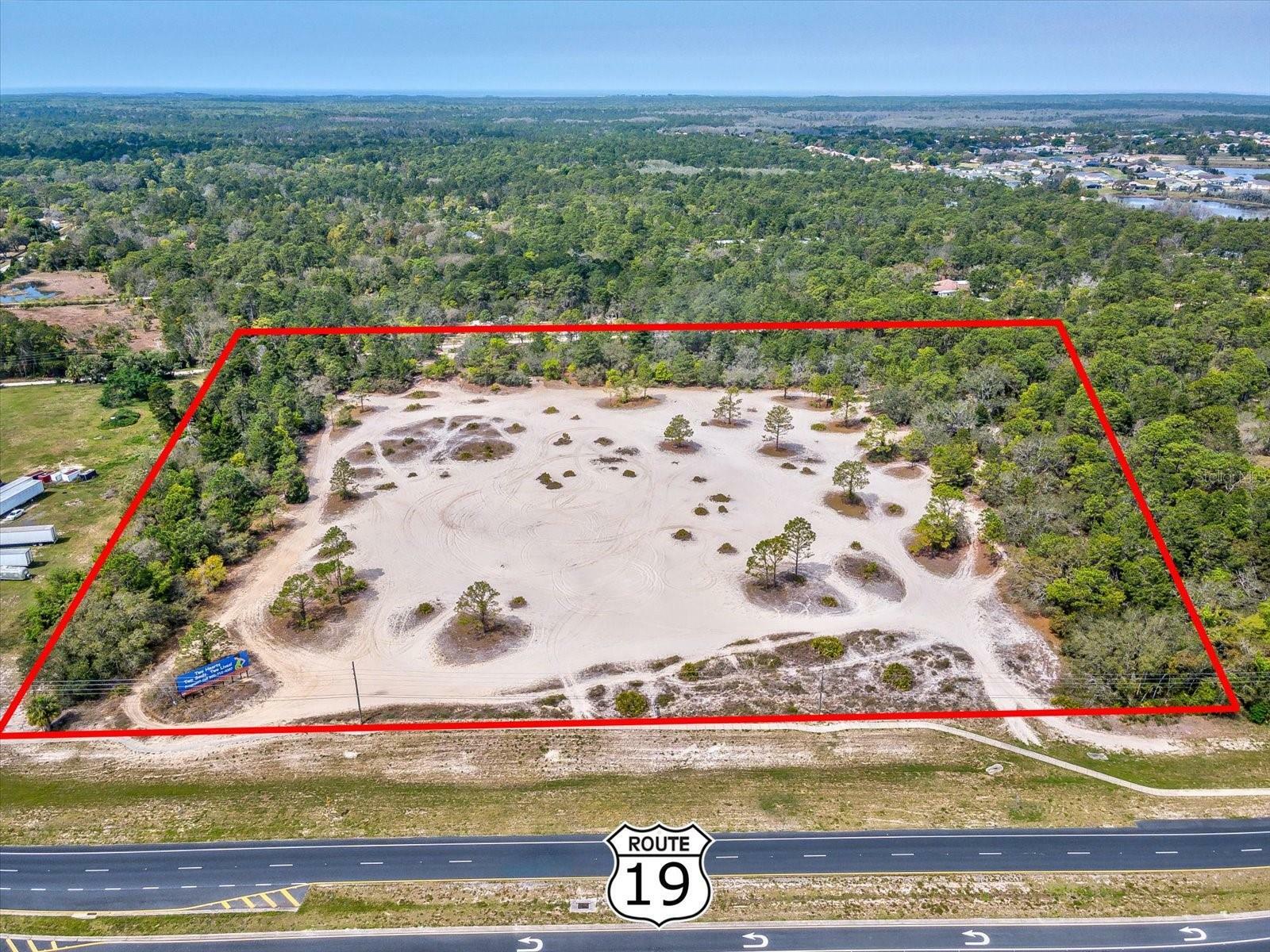 15.7 Acres Commercial Way  Weeki Wachee FL 34613 photo